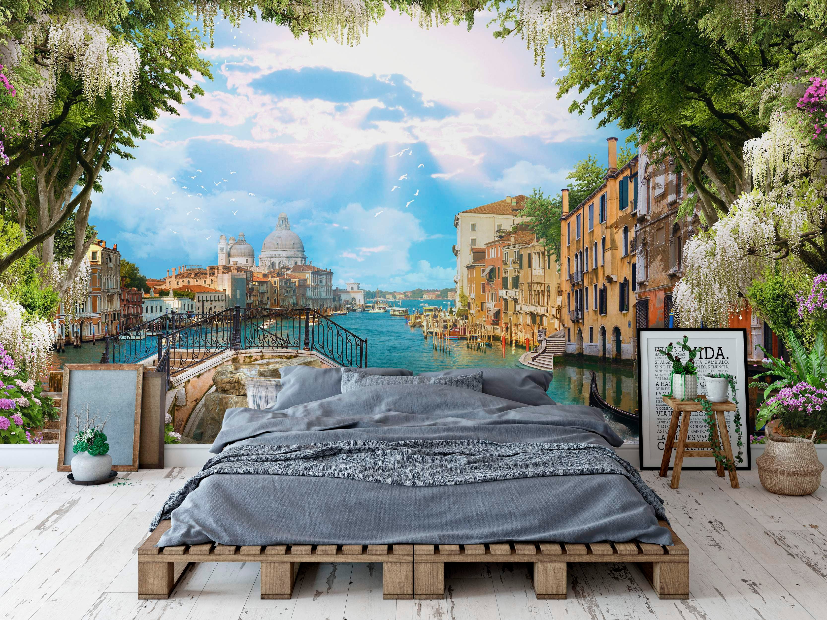 Scenic Venice mural featuring the Grand Canal, Santa Maria della Salute, bridge, and buildings, framed by trees with white wisteria.
