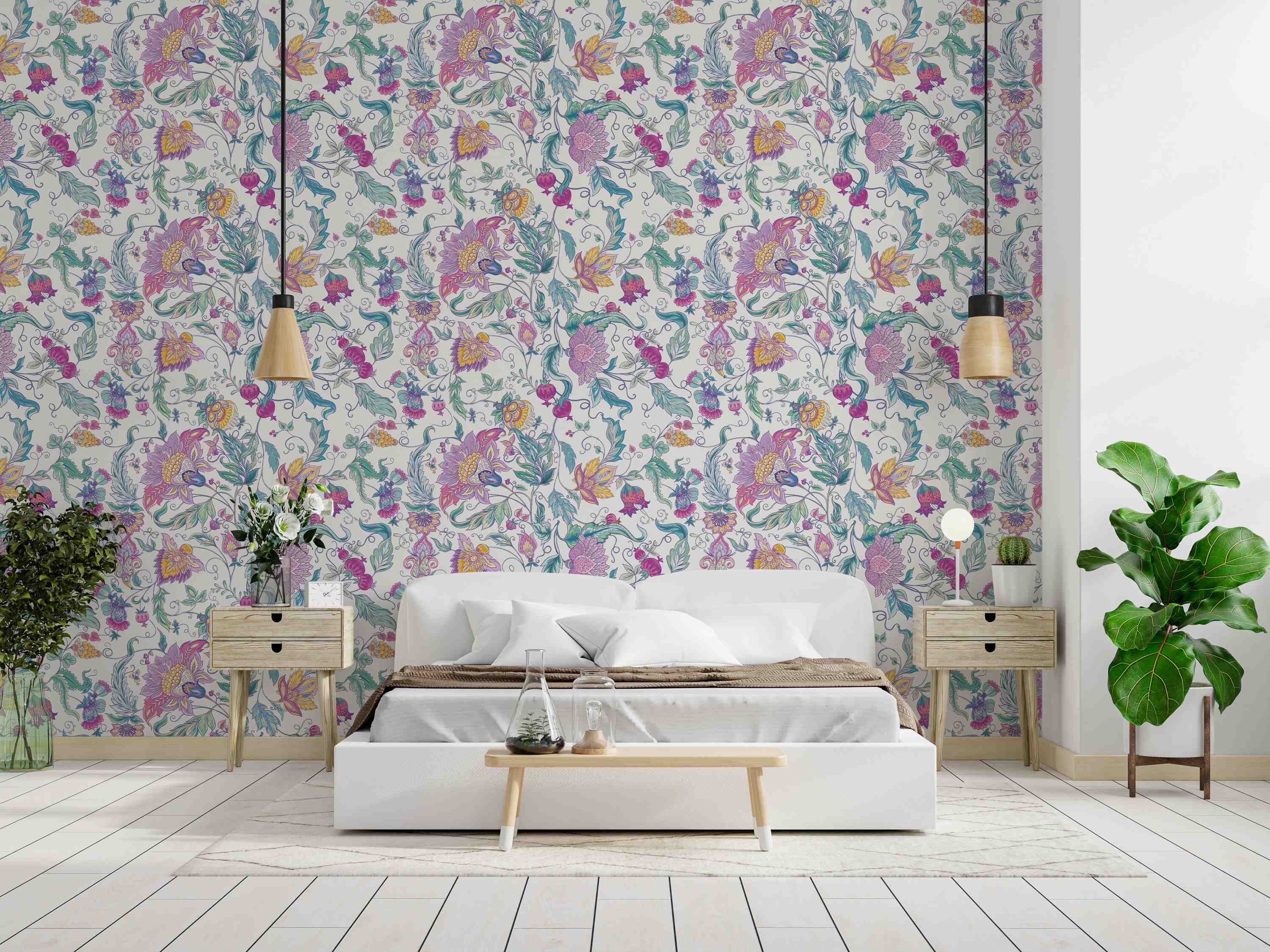 Vintage floral wallpaper with intricate pink, purple, yellow, and teal stylized flowers and vines on a light background.