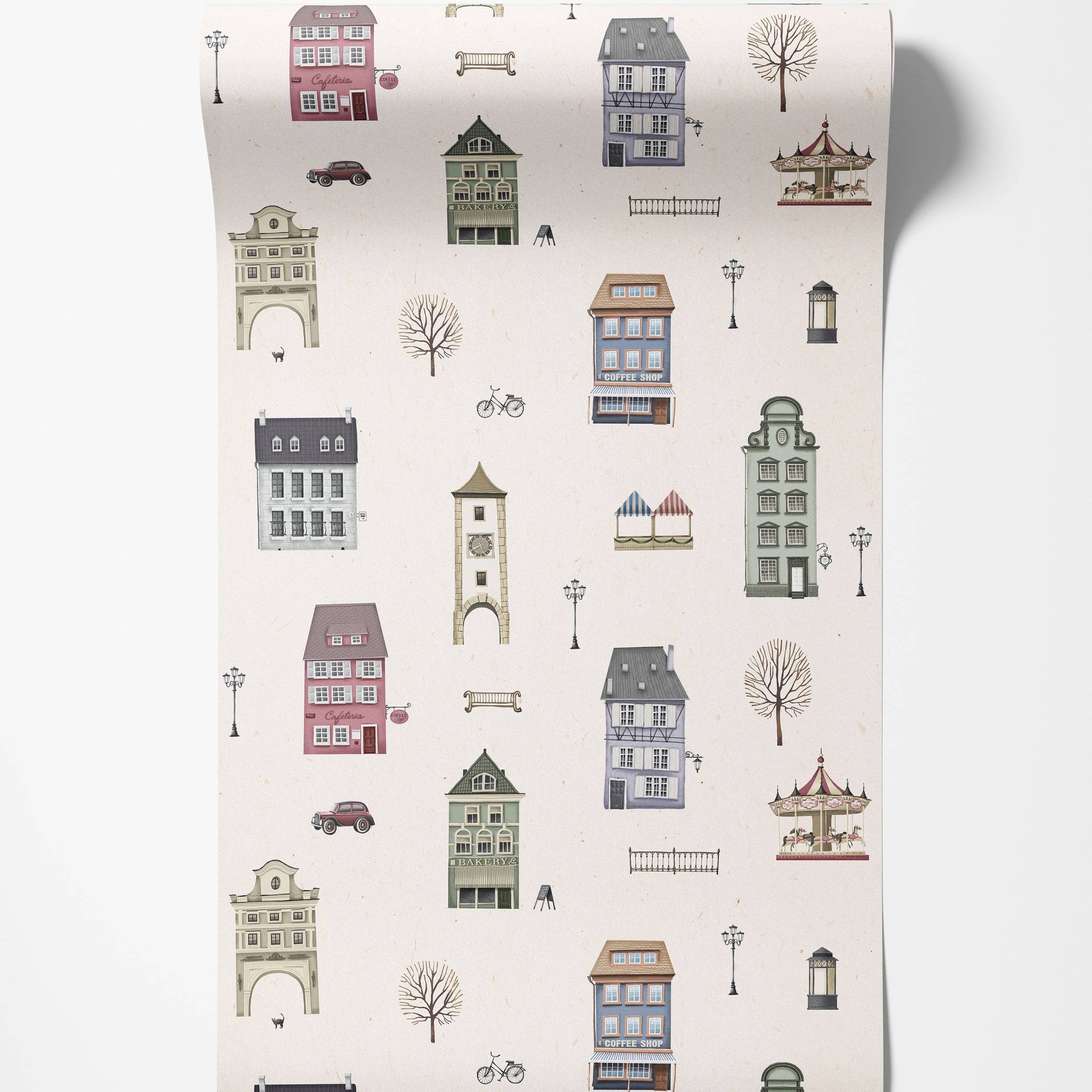 Vintage illustrative wallpaper with a repeating European town pattern: buildings, trees, carousels in muted tones on beige.