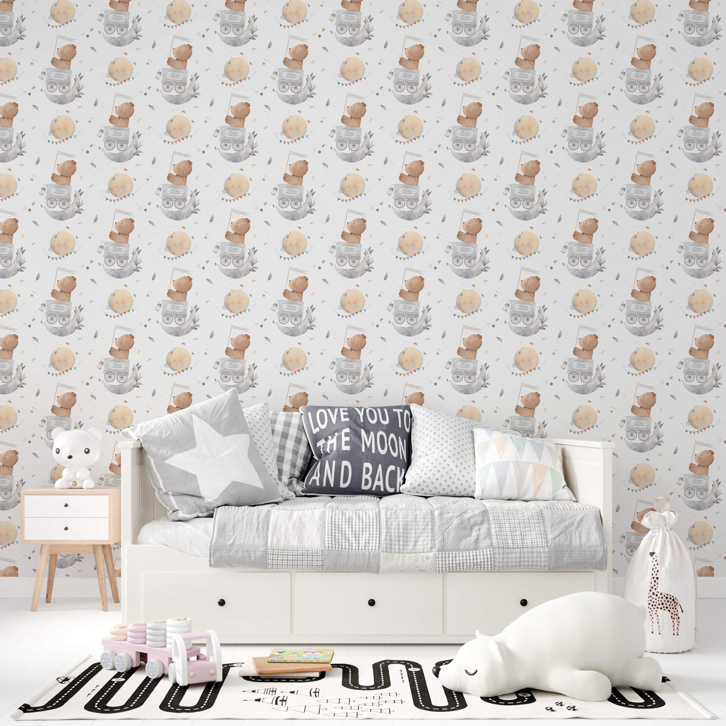 Watercolor wallpaper showing brown teddy bears in gray carts on moons and yellow planets with bunting on a light background.