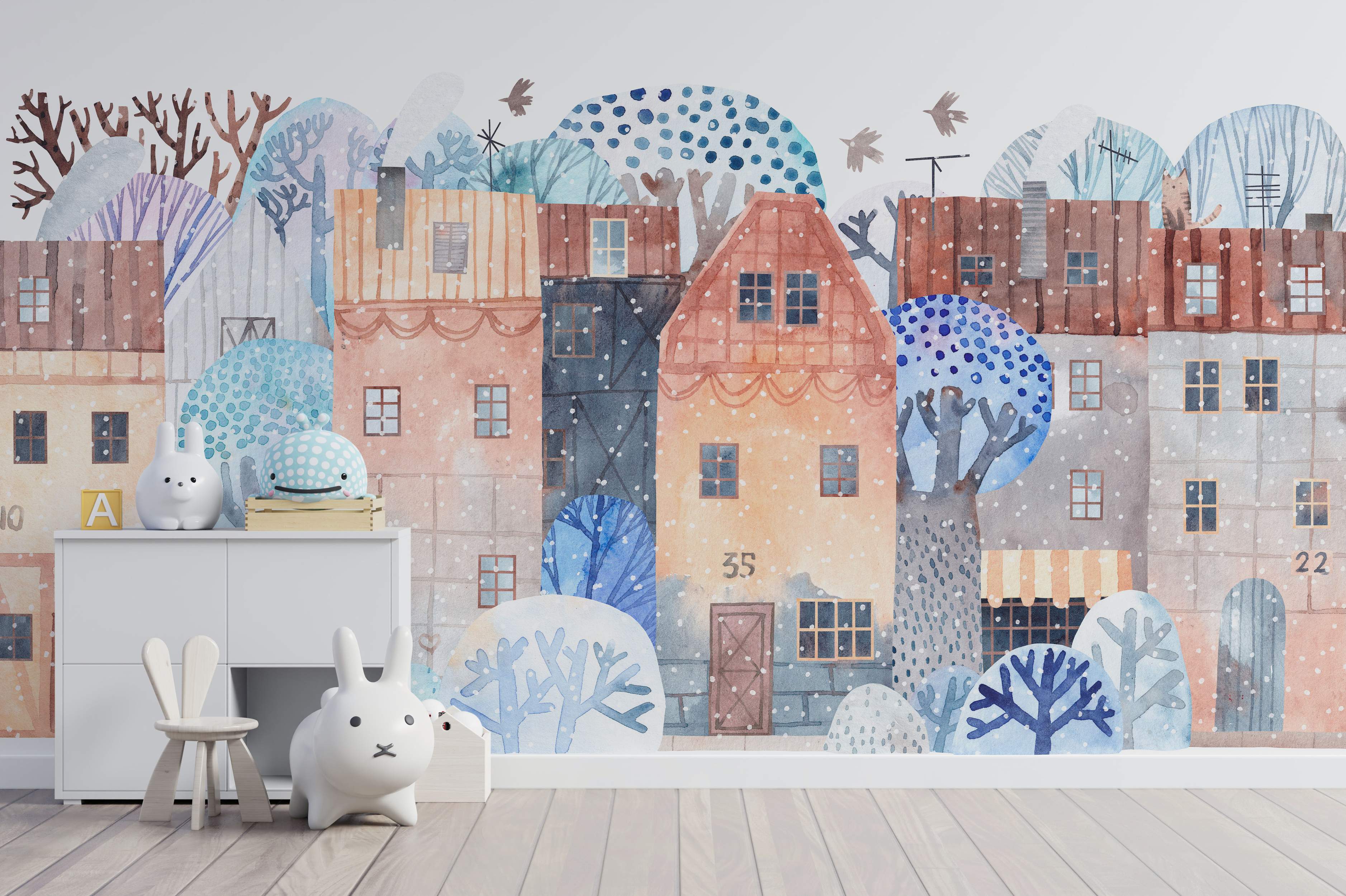 Watercolor mural of a whimsical snowy cityscape with stylized houses and trees in muted blues, browns, and oranges.