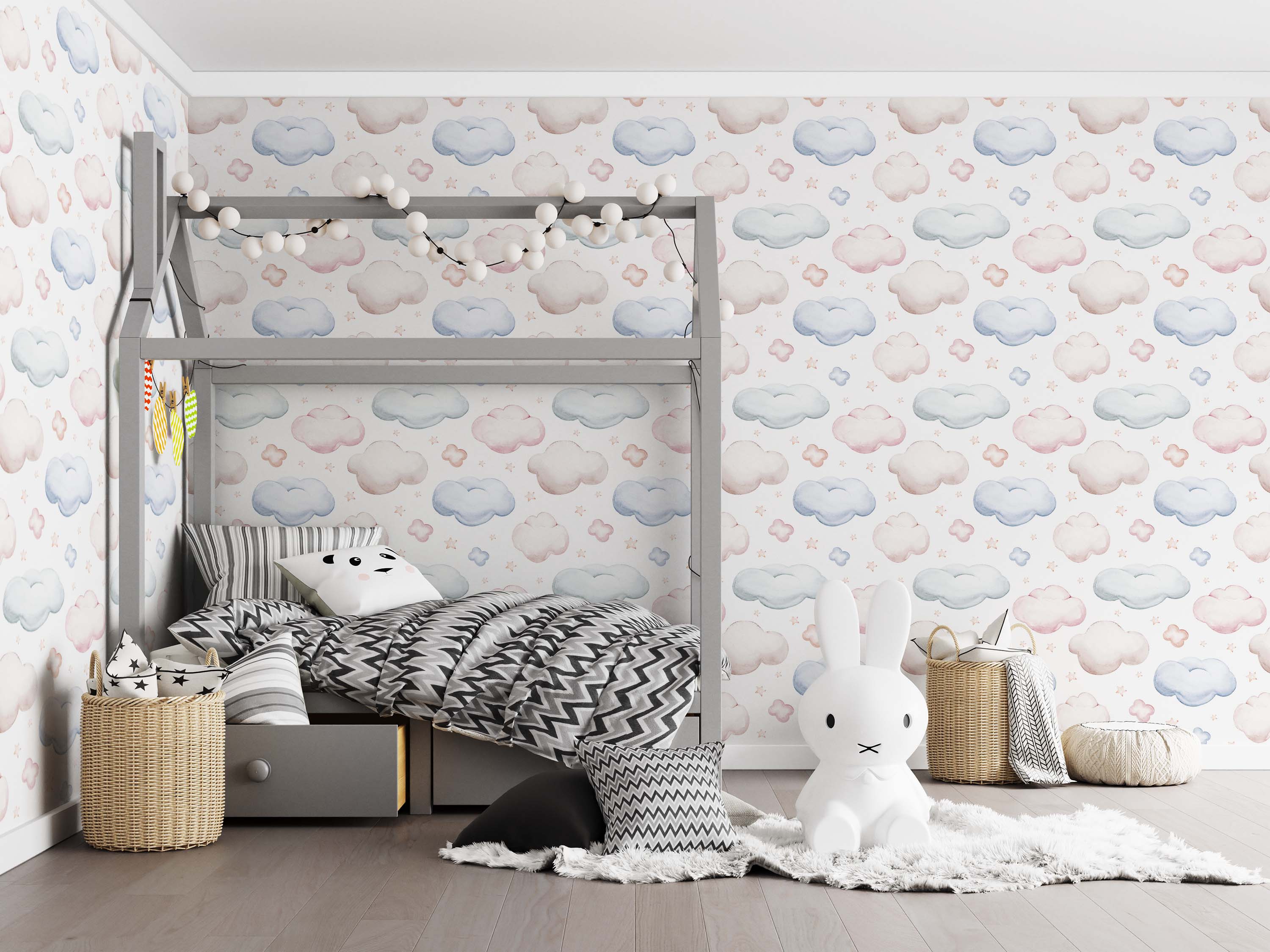 Watercolor wallpaper with a repeating pattern of soft blue, pink, and light gray clouds and small orange stars on a white background.