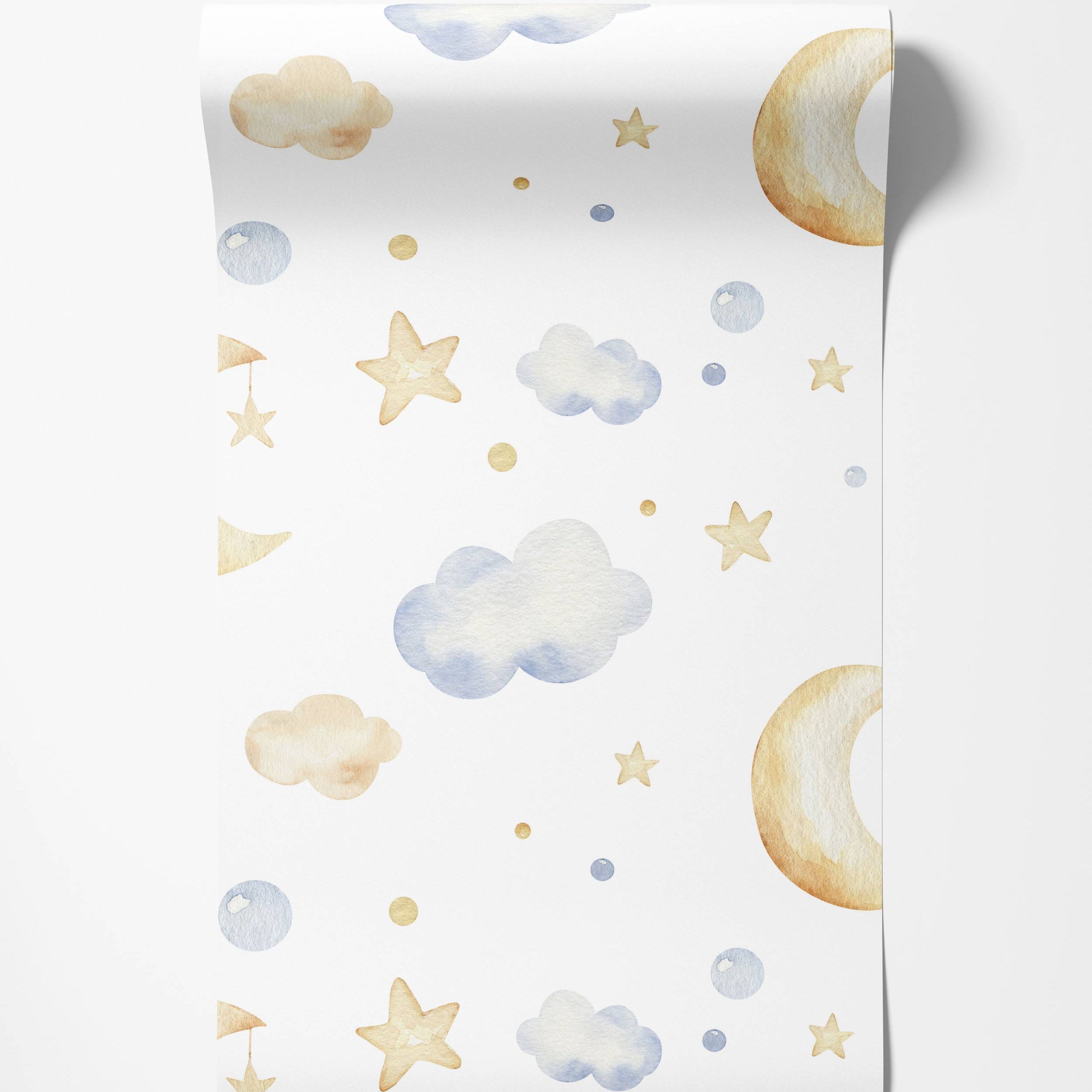 Wallpaper with a watercolor pattern of light blue and beige clouds, yellow stars, yellow crescent moons, and small blue and yellow dots.
