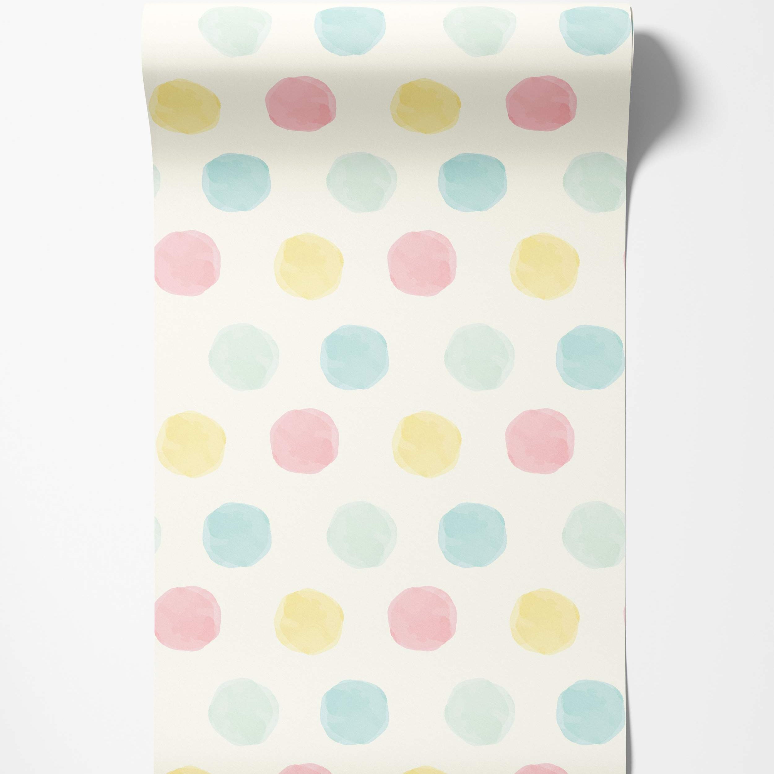 Soft watercolor polka dot wallpaper featuring pastel blue, pink, and yellow dots on a cream background.