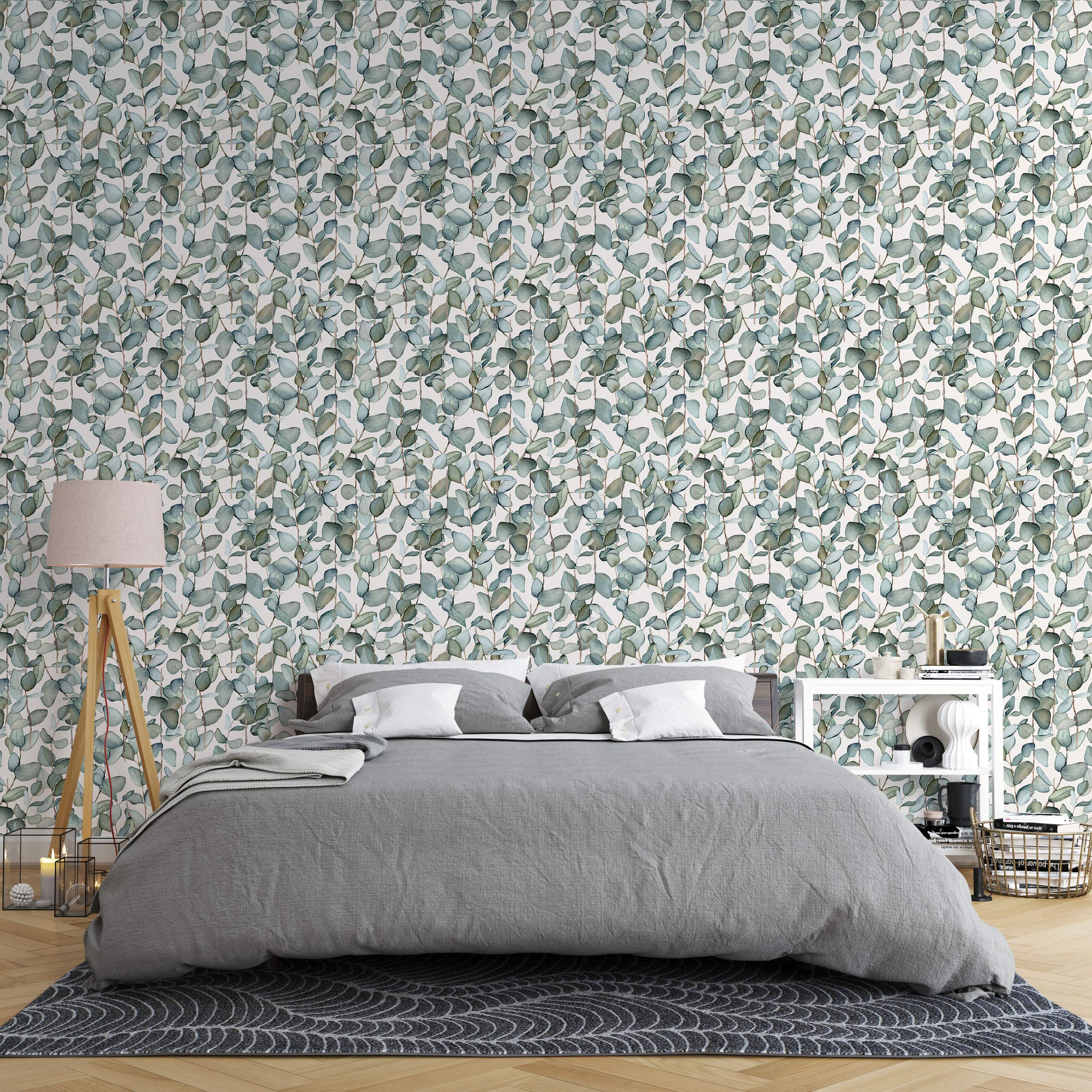 Wallpaper features watercolor eucalyptus branches with soft green and blue-green leaves on a light background.