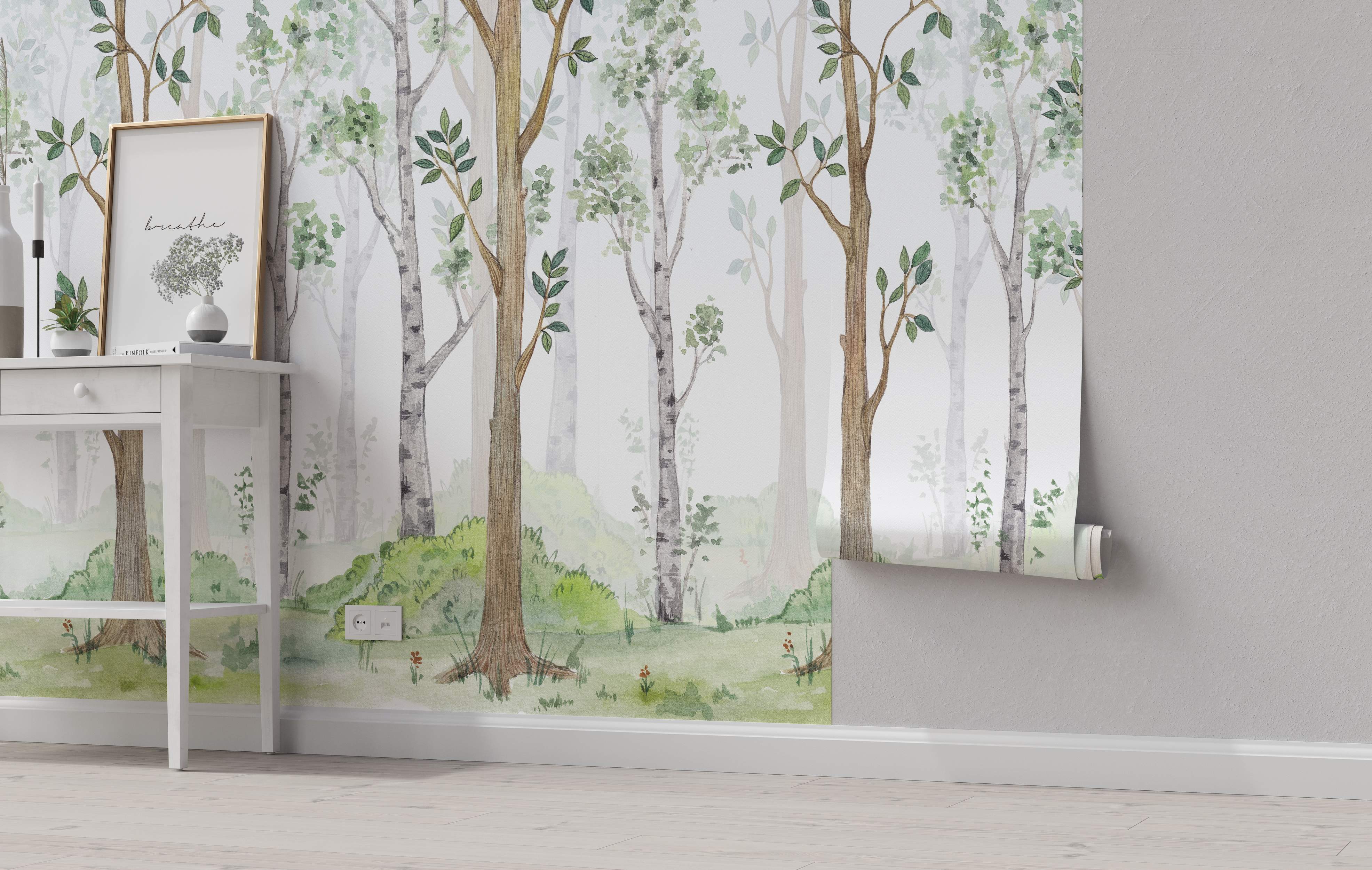 Watercolor mural depicting a forest scene with birch and brown trees with green leaves against a soft white background.