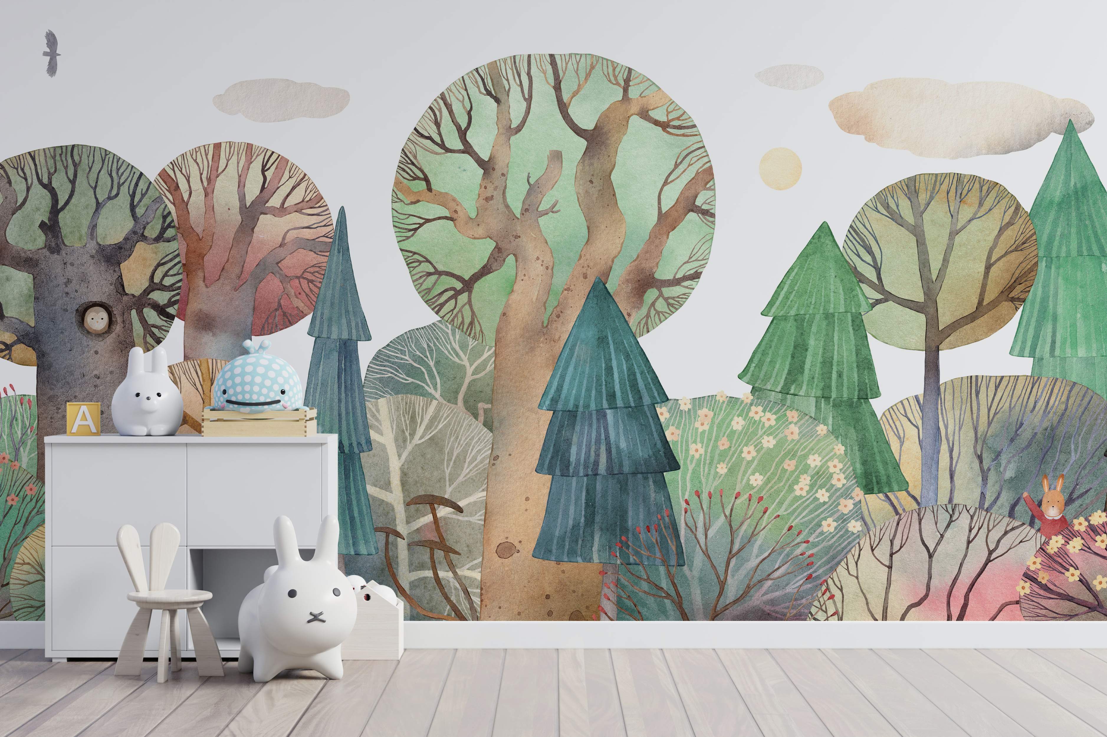 Whimsical watercolor forest mural featuring stylized trees, bushes, clouds, and a sun in muted earthy greens, browns, and beige.