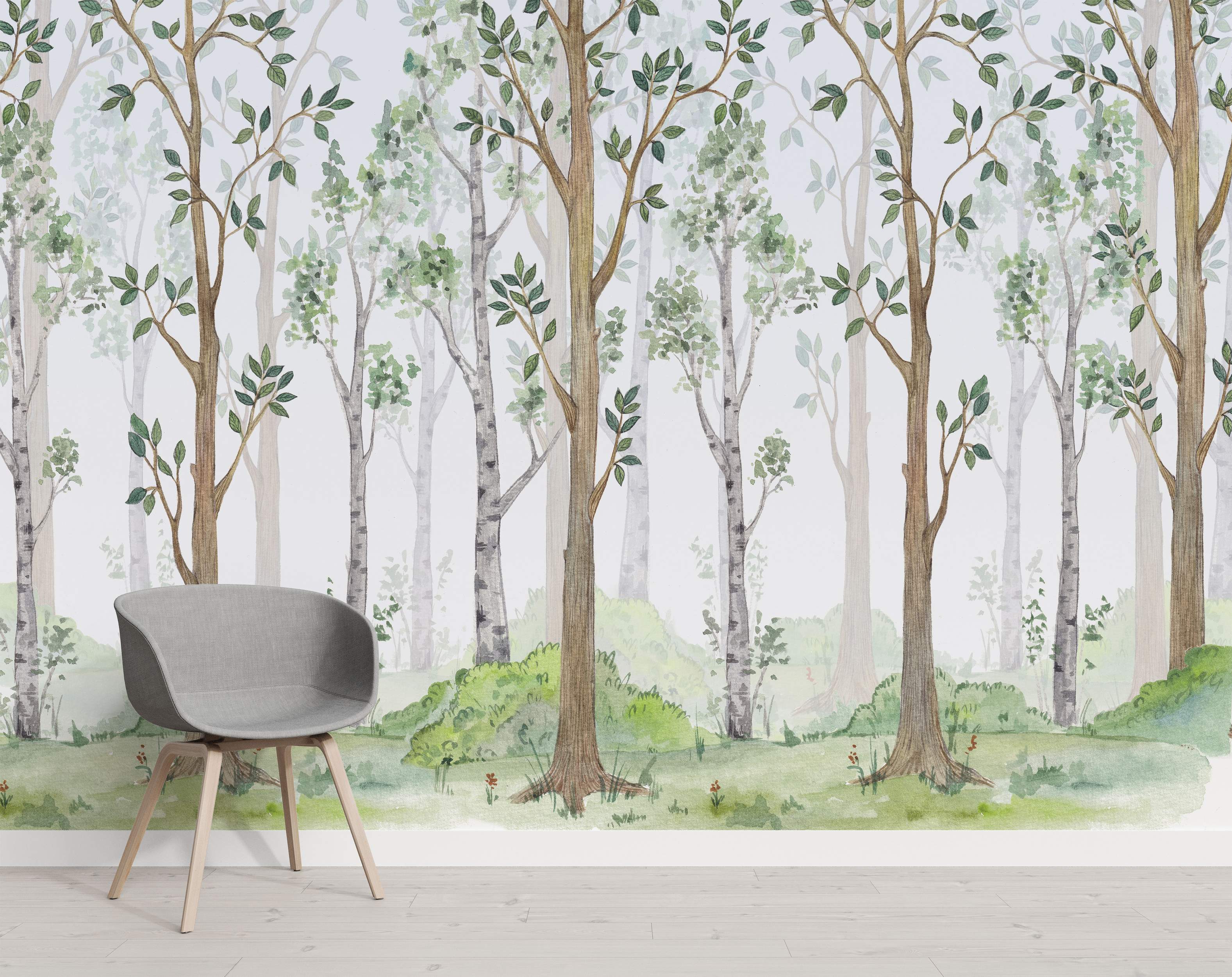Watercolor mural depicting a forest scene with birch and brown trees, green leaves, and a grassy foreground against a light background.
