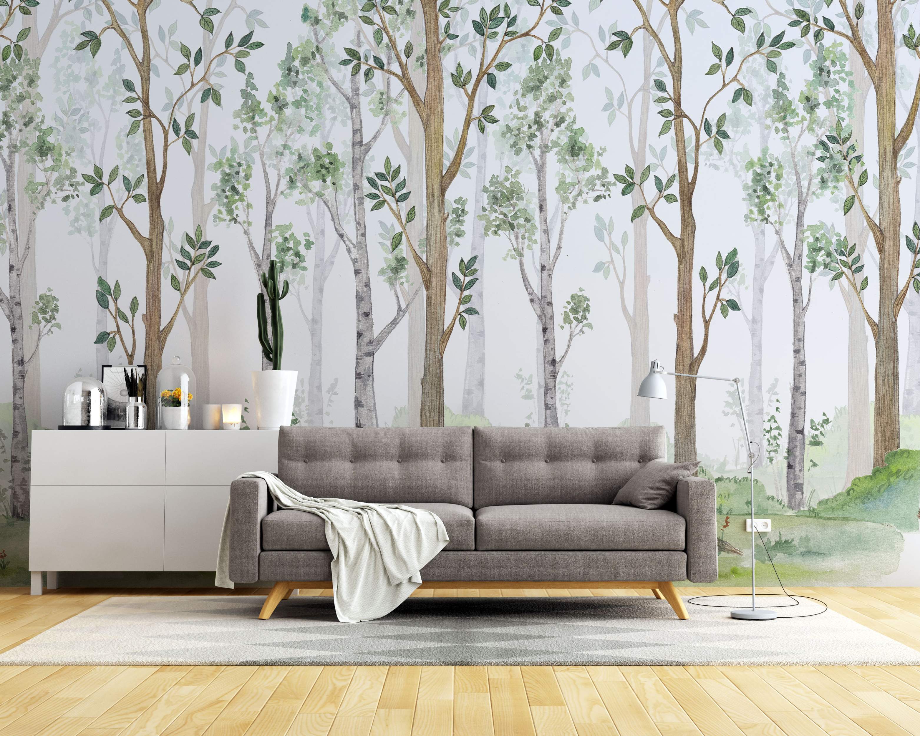Watercolor style forest mural featuring birch and brown trees with green leaves on a light, hazy background.