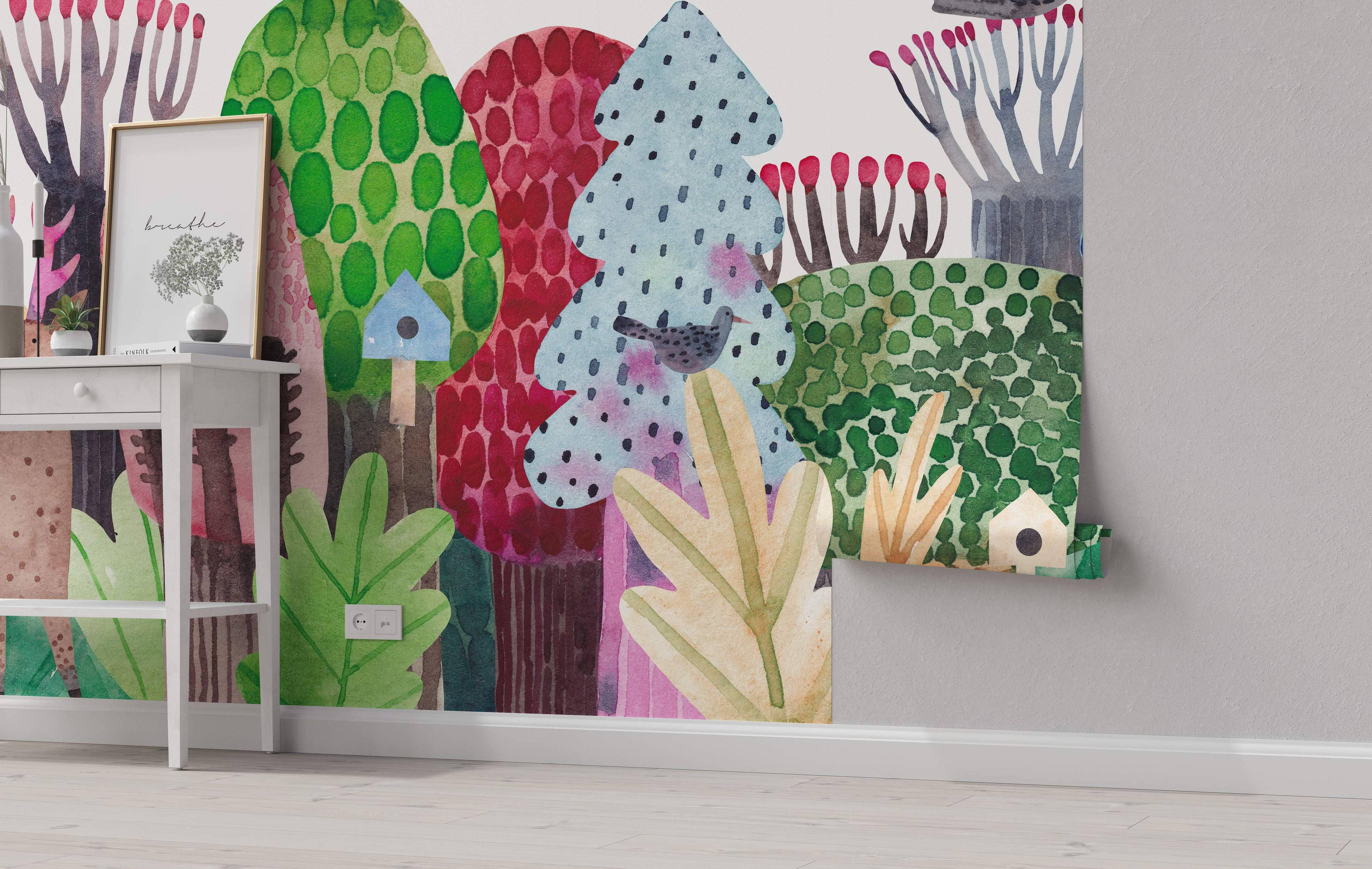 Painterly watercolor mural depicting a whimsical forest with stylized trees in green, red, blue, and brown hues.