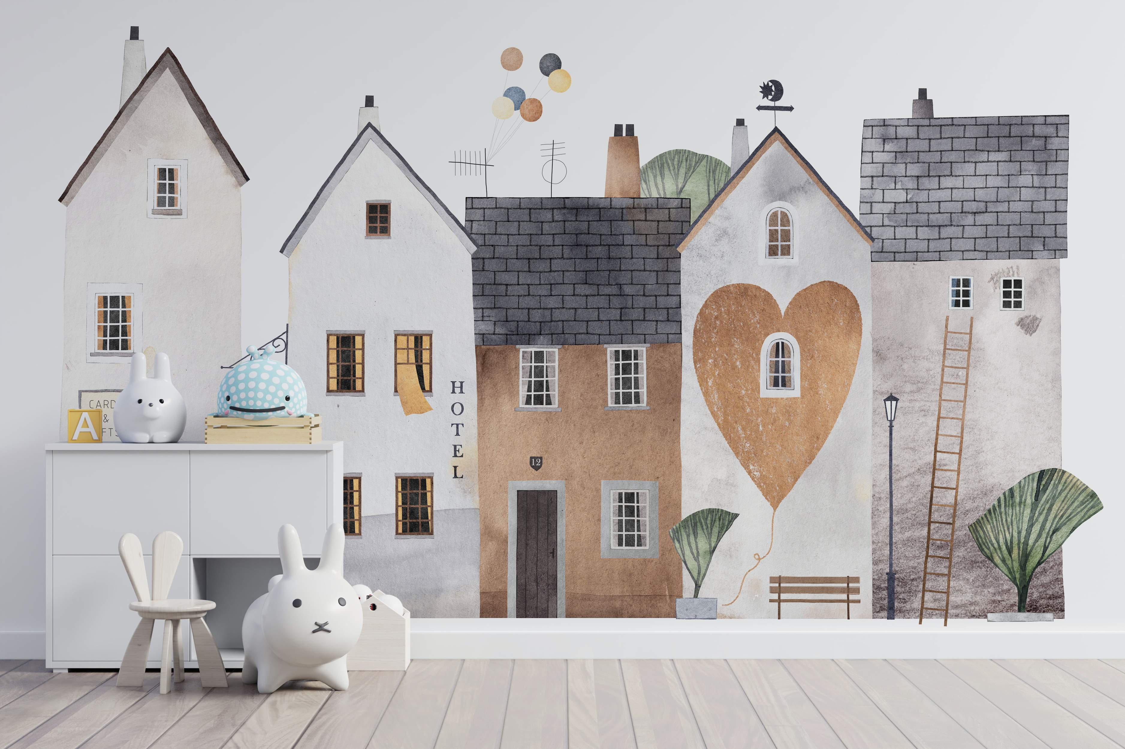 Watercolor mural featuring a charming street scene with stylized houses in neutral tones of white, beige, brown, and grey.