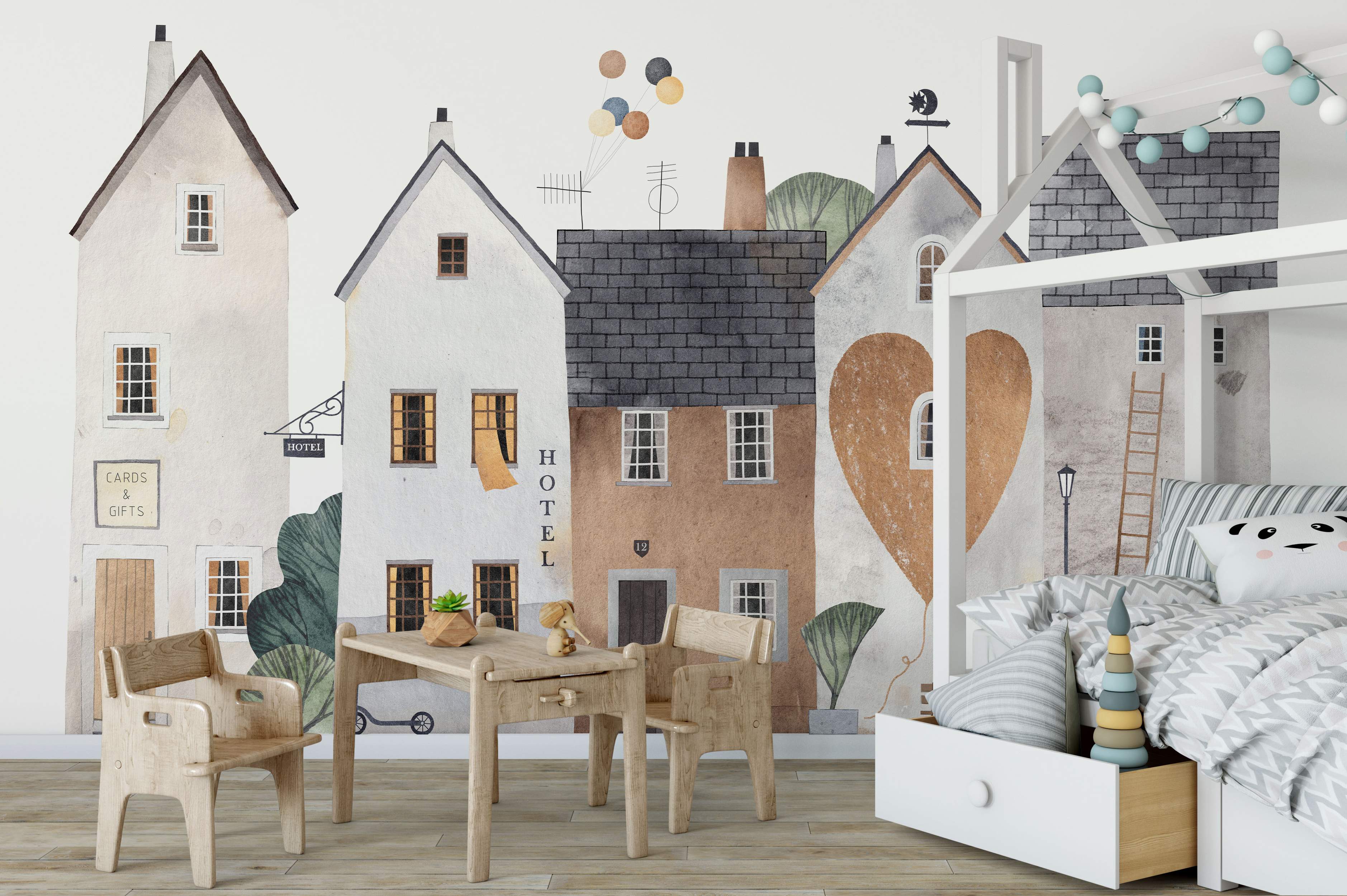 Watercolor town scene mural featuring quaint houses, trees, and balloons in soft beige, gray, brown, and green tones.