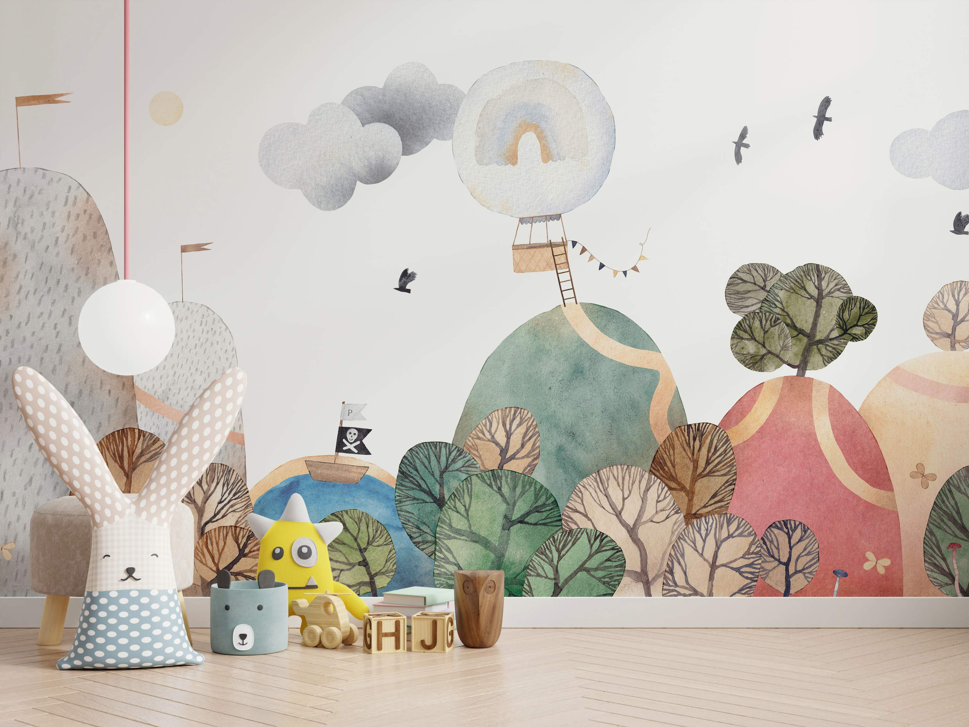 Whimsical watercolor kids' landscape mural with stylized hills, trees, hot air balloon, pirate ship, and clouds in muted colors.