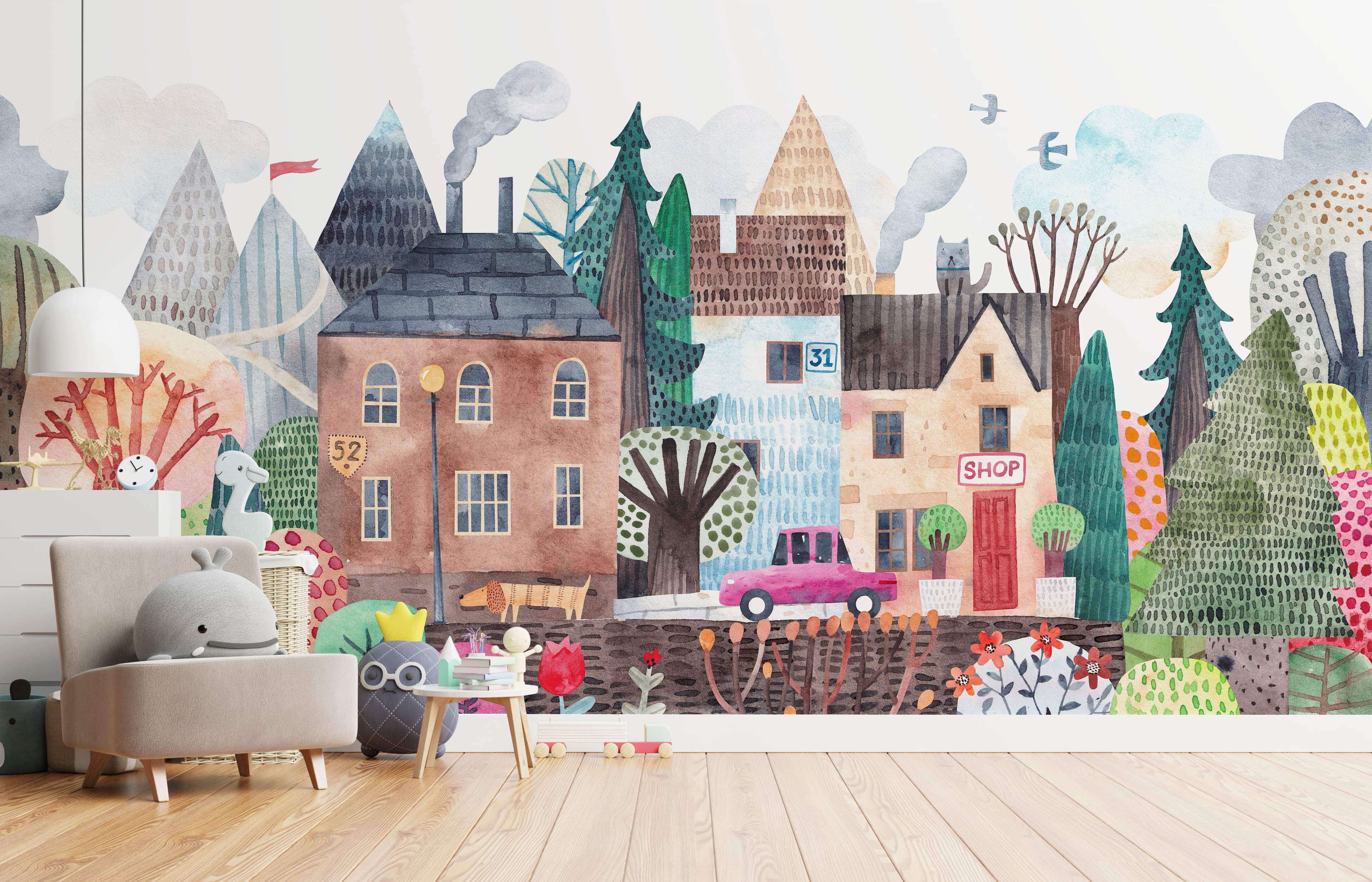 A whimsical watercolor mural showing a colorful town with houses, trees, mountains, a pink car, dog, and birds. Naive style.