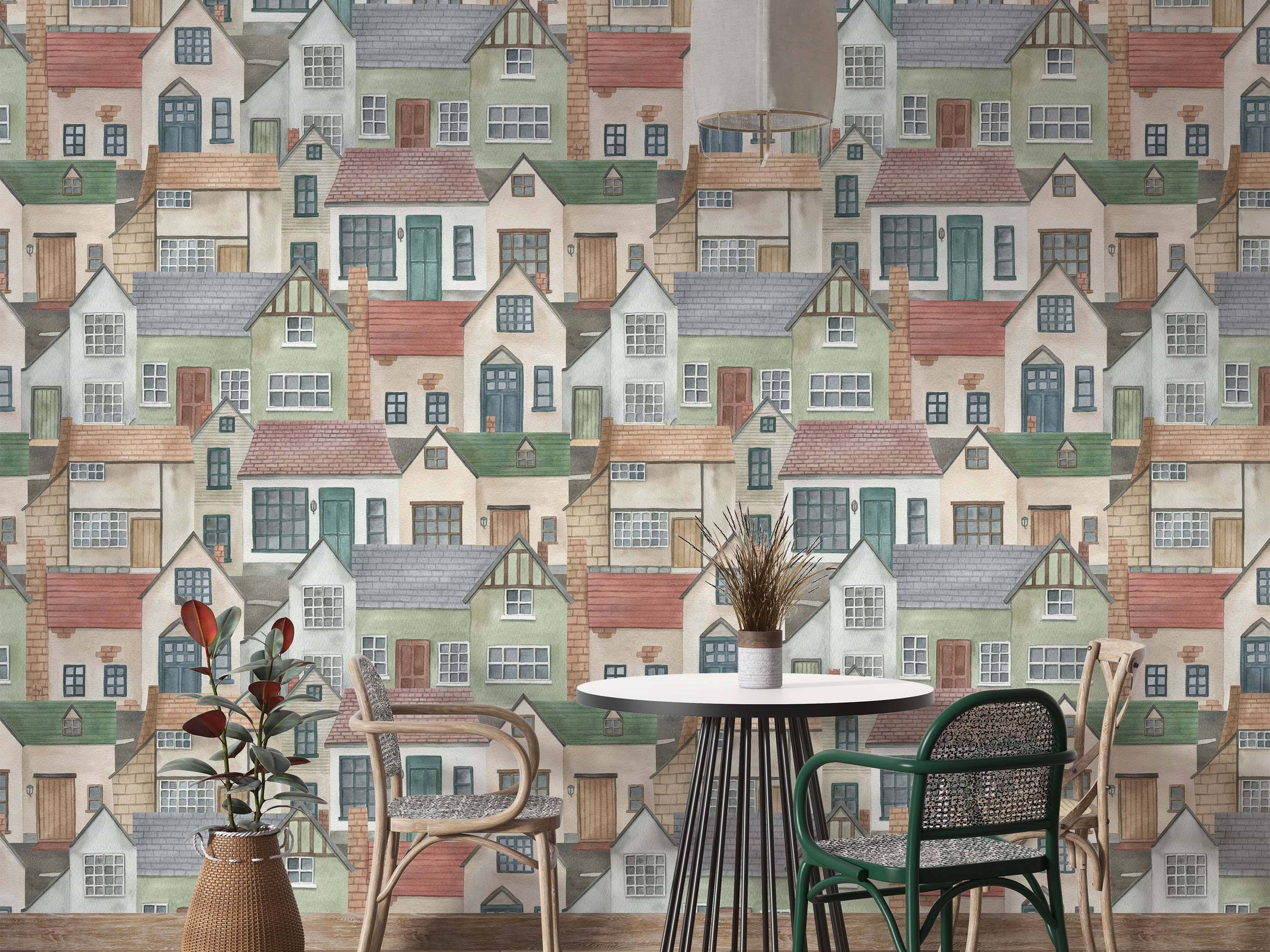 Wallpaper featuring a repeating pattern of overlapping watercolour houses in muted greens, reds, grays, and beiges.