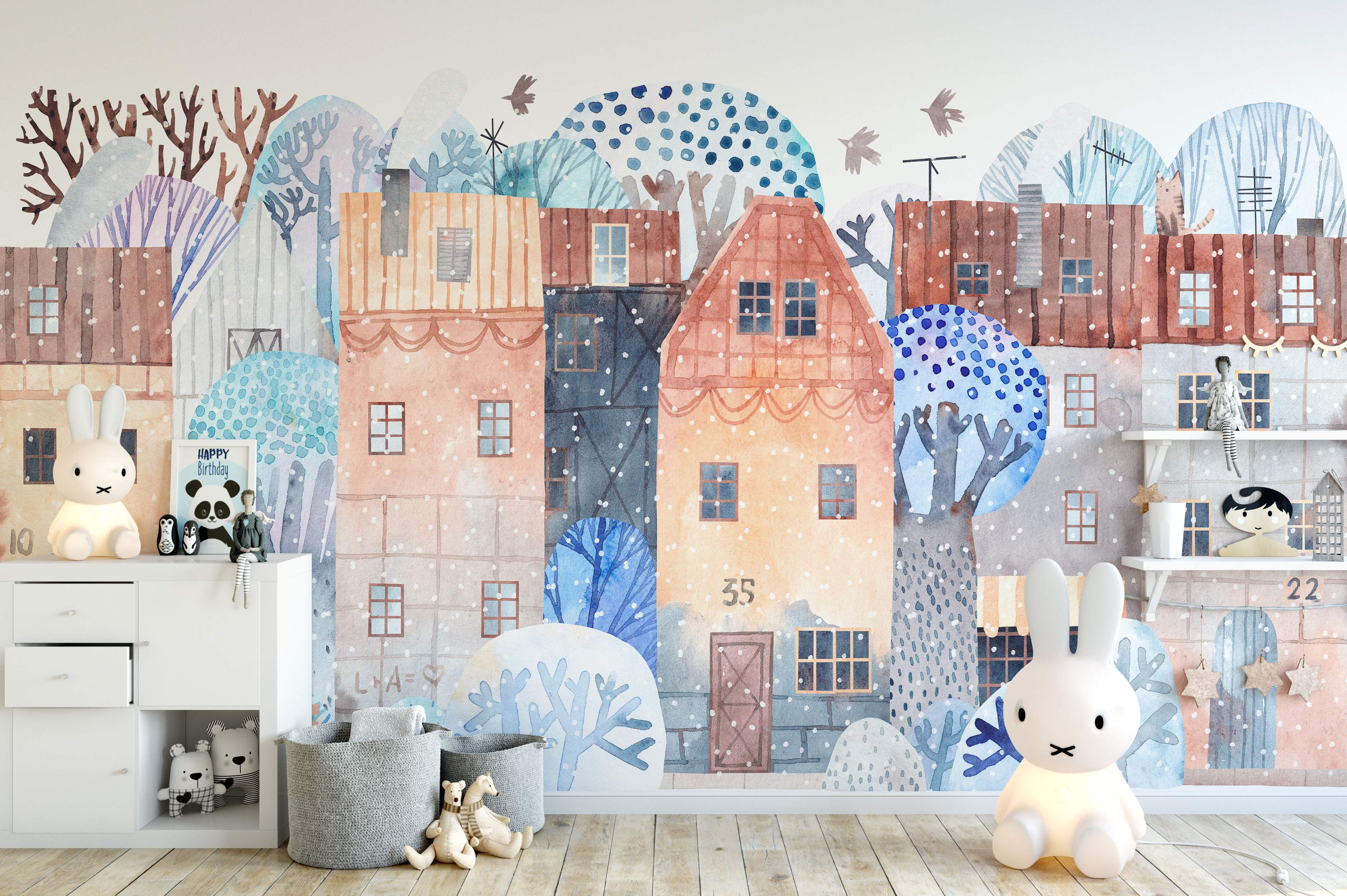 Watercolor mural of a quaint winter village with stylized houses and trees in soft blues, browns, and oranges under falling snow.