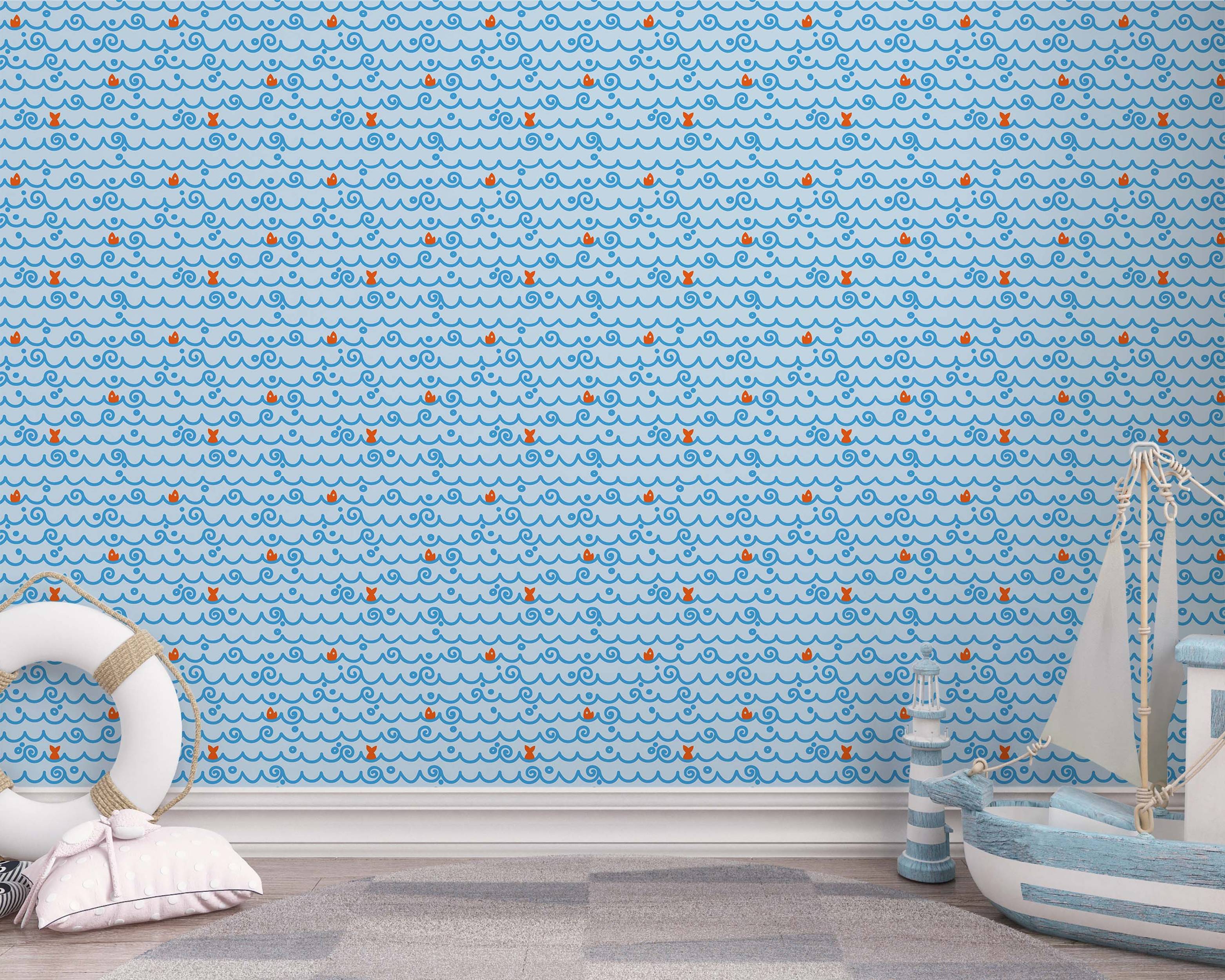 Wallpaper with repeating blue stylized waves, swirls, dots, and small orange fish on a light blue background.