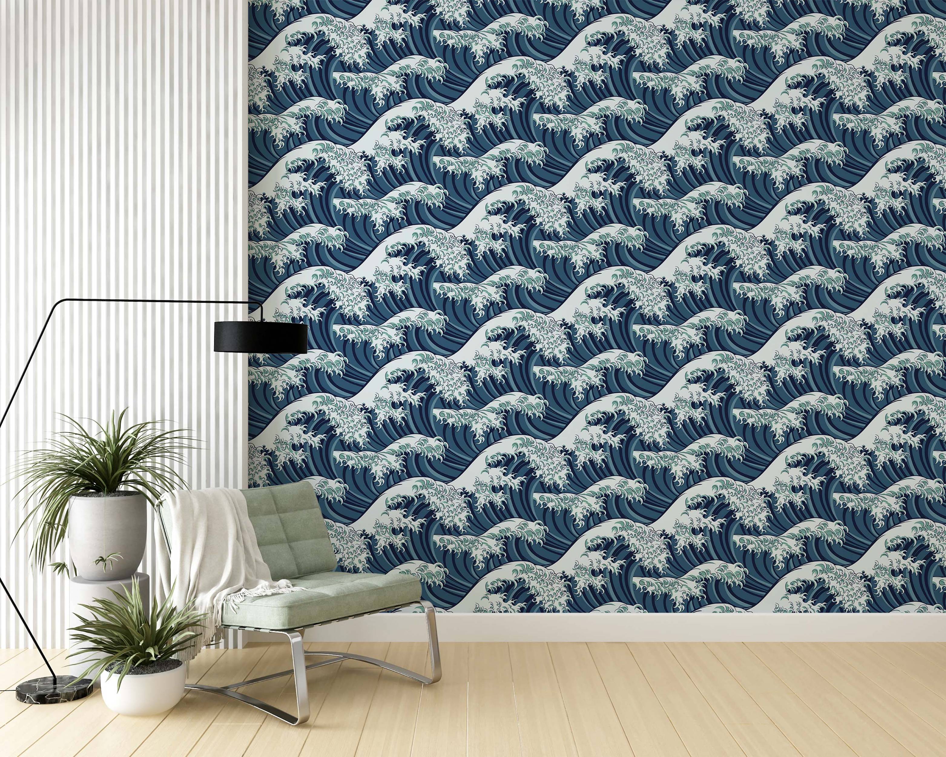 Wallpaper featuring a repeating pattern of stylized Japanese ocean waves in various shades of blue and white.