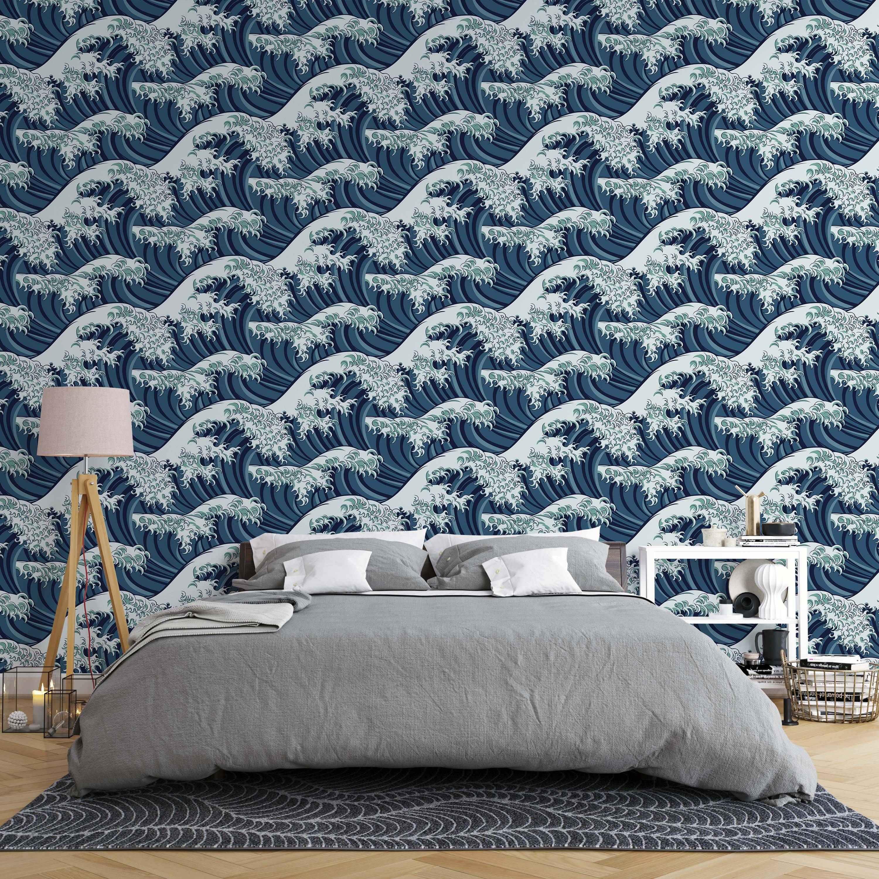 Repeating wallpaper pattern of stylized ocean waves in various shades of blue with white foam details.