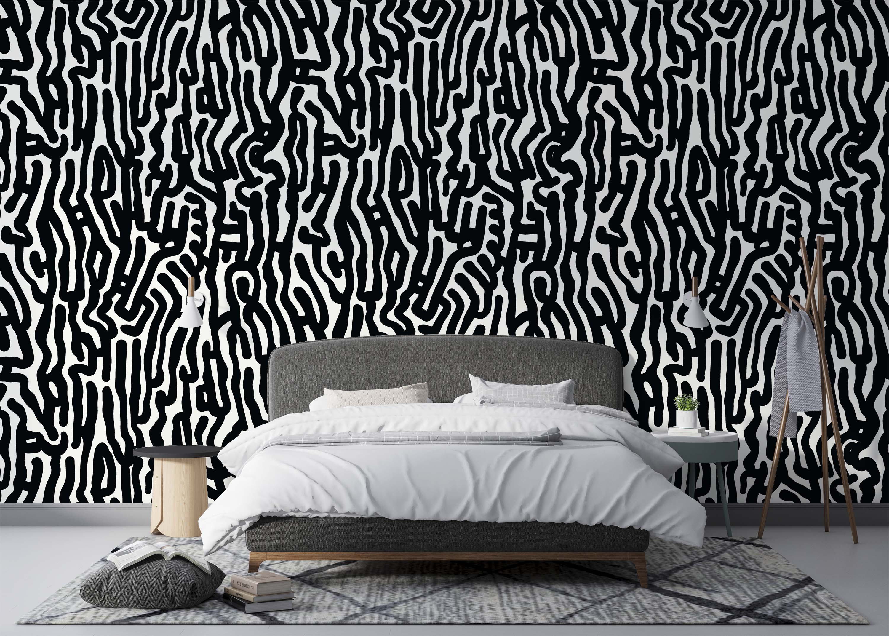 Wallpaper featuring a dense pattern of thick, flowing, interconnected black lines on a white background.