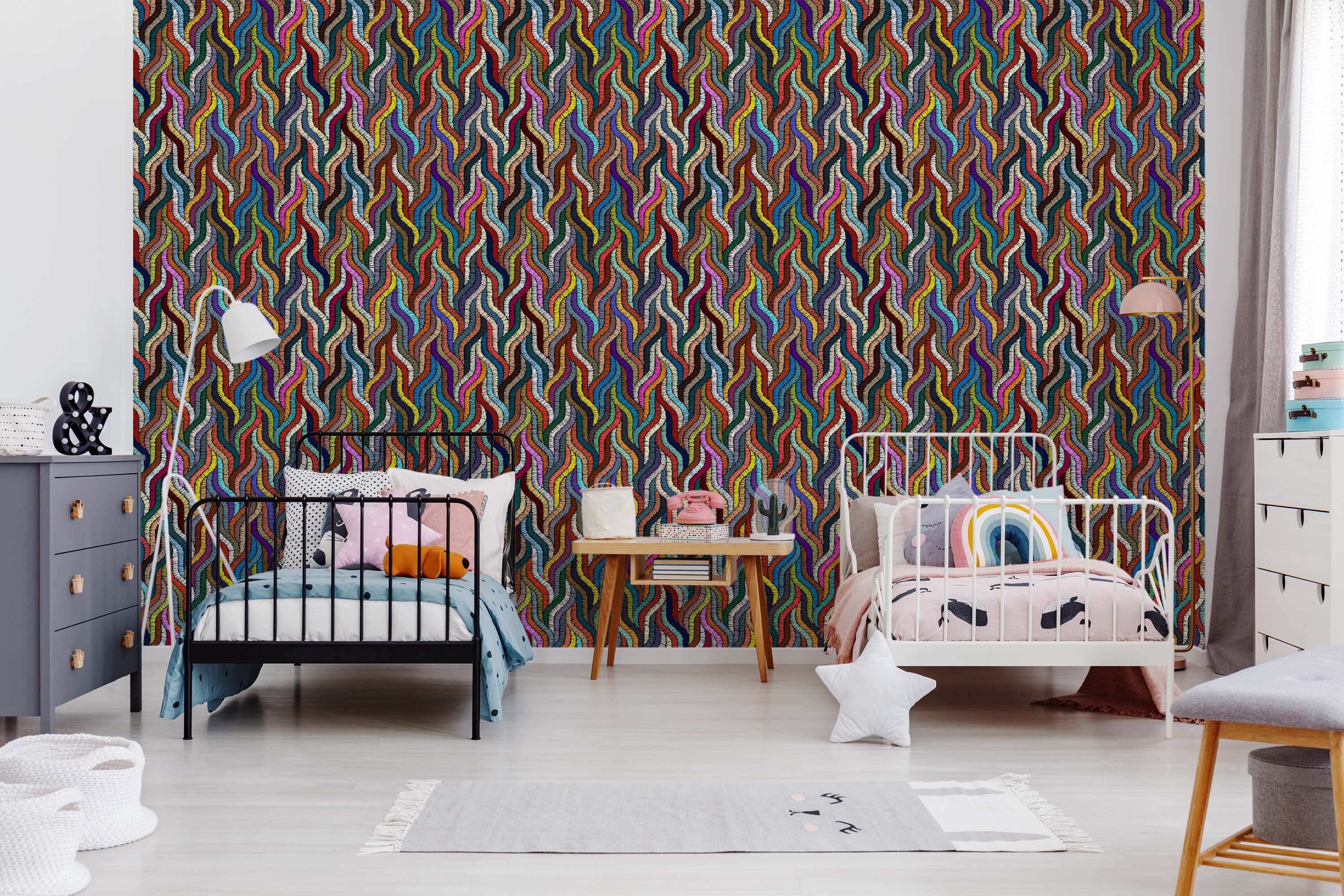 Wallpaper featuring a dense, repeating pattern of vertical, wavy lines in many colors, with an embroidered or stitched texture.