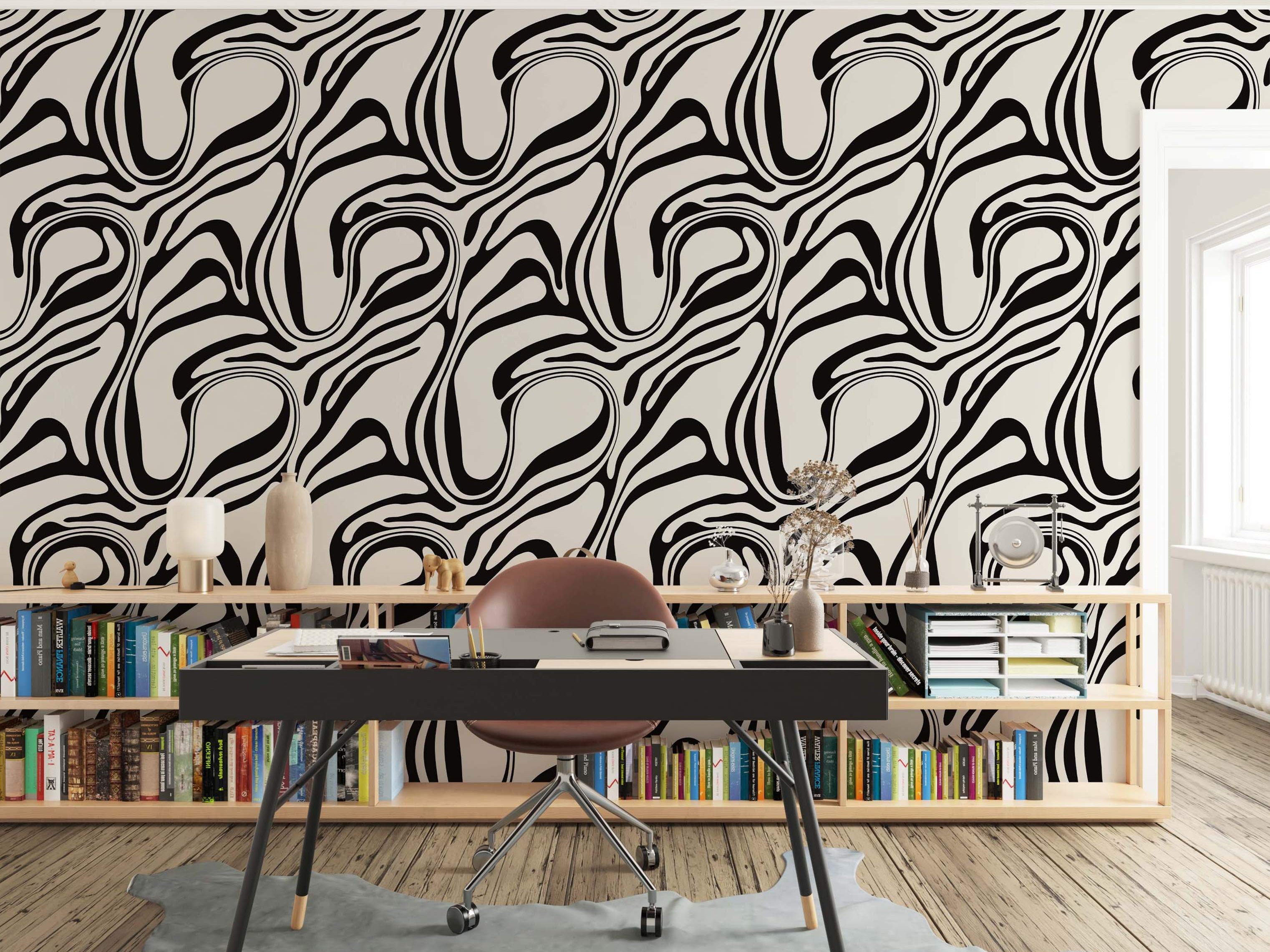Abstract wallpaper featuring thick, swirling black lines creating a fluid, wavy pattern on a creamy off-white background.