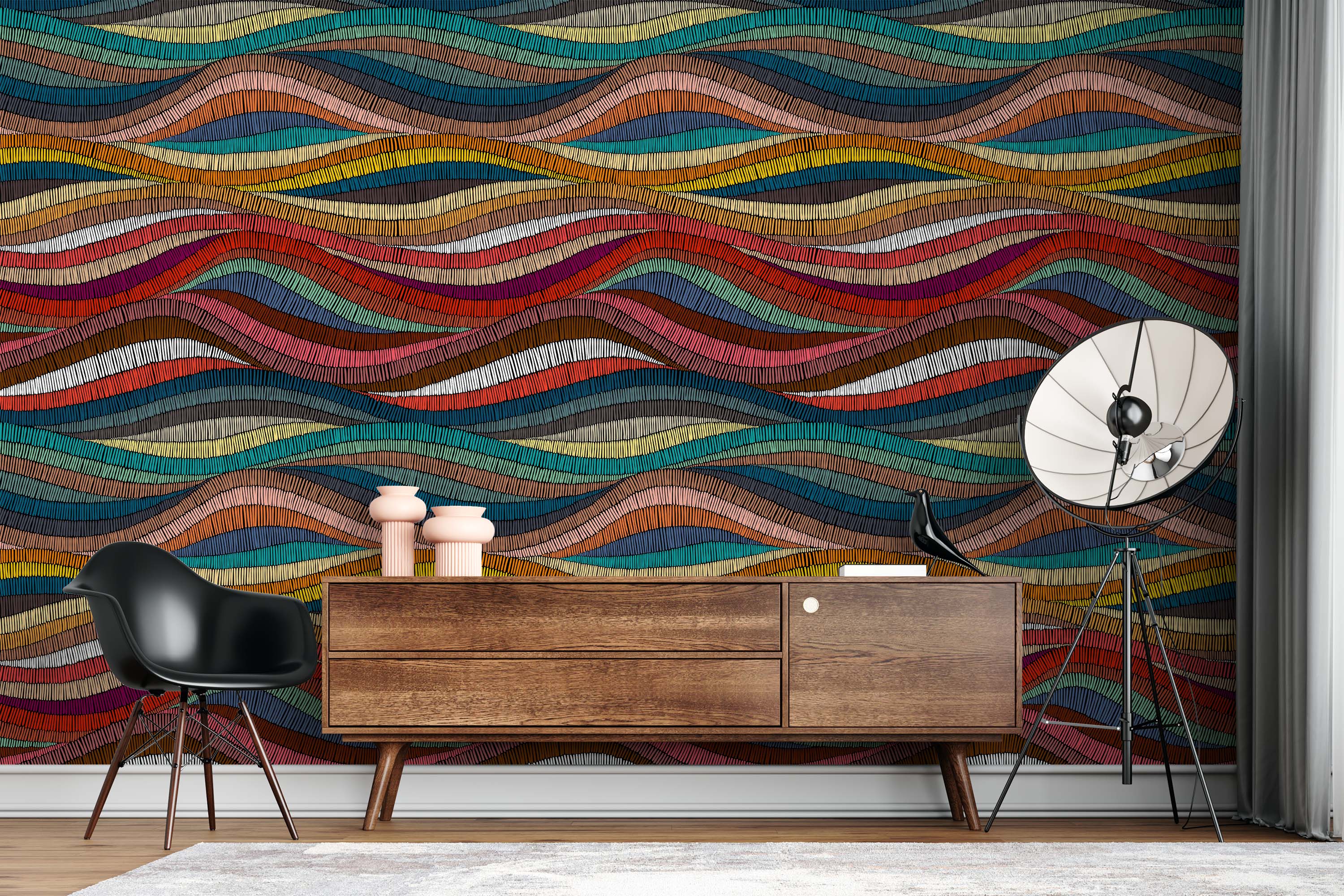 Wallpaper displaying colorful, wavy horizontal stripes with a textured, hand-stitched appearance in varied vibrant hues.