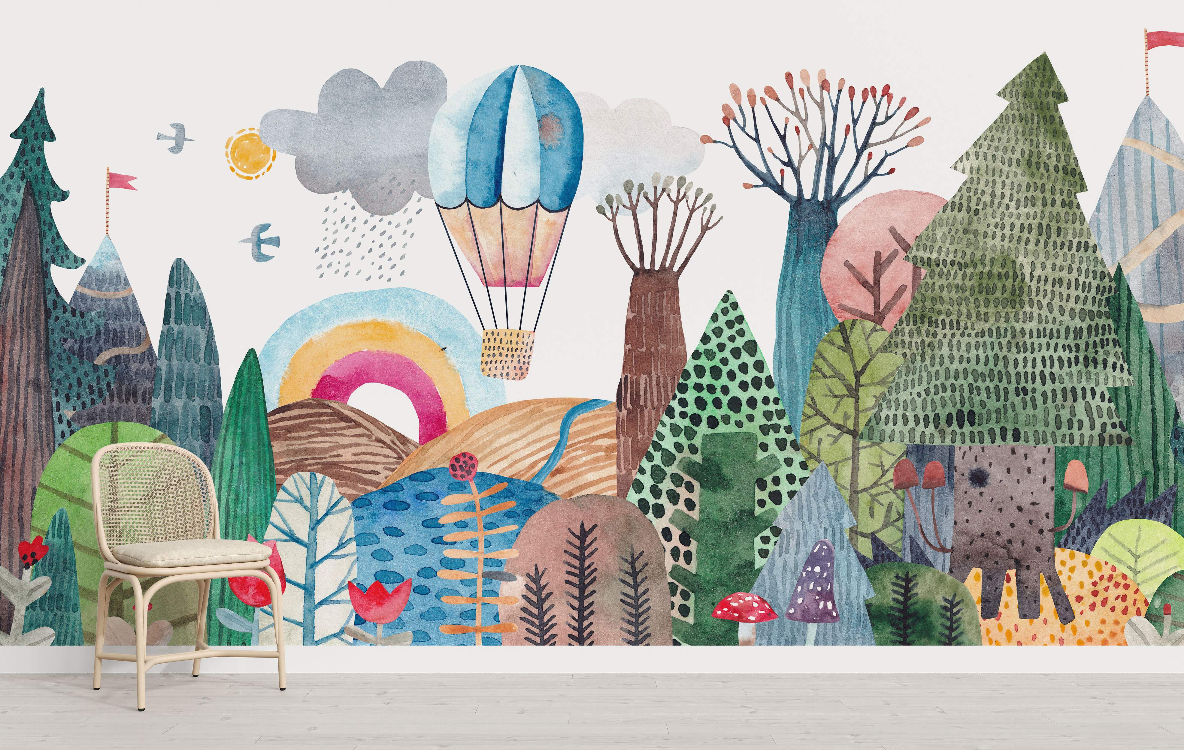 Whimsical forest mural with colorful trees and a hot air balloon.