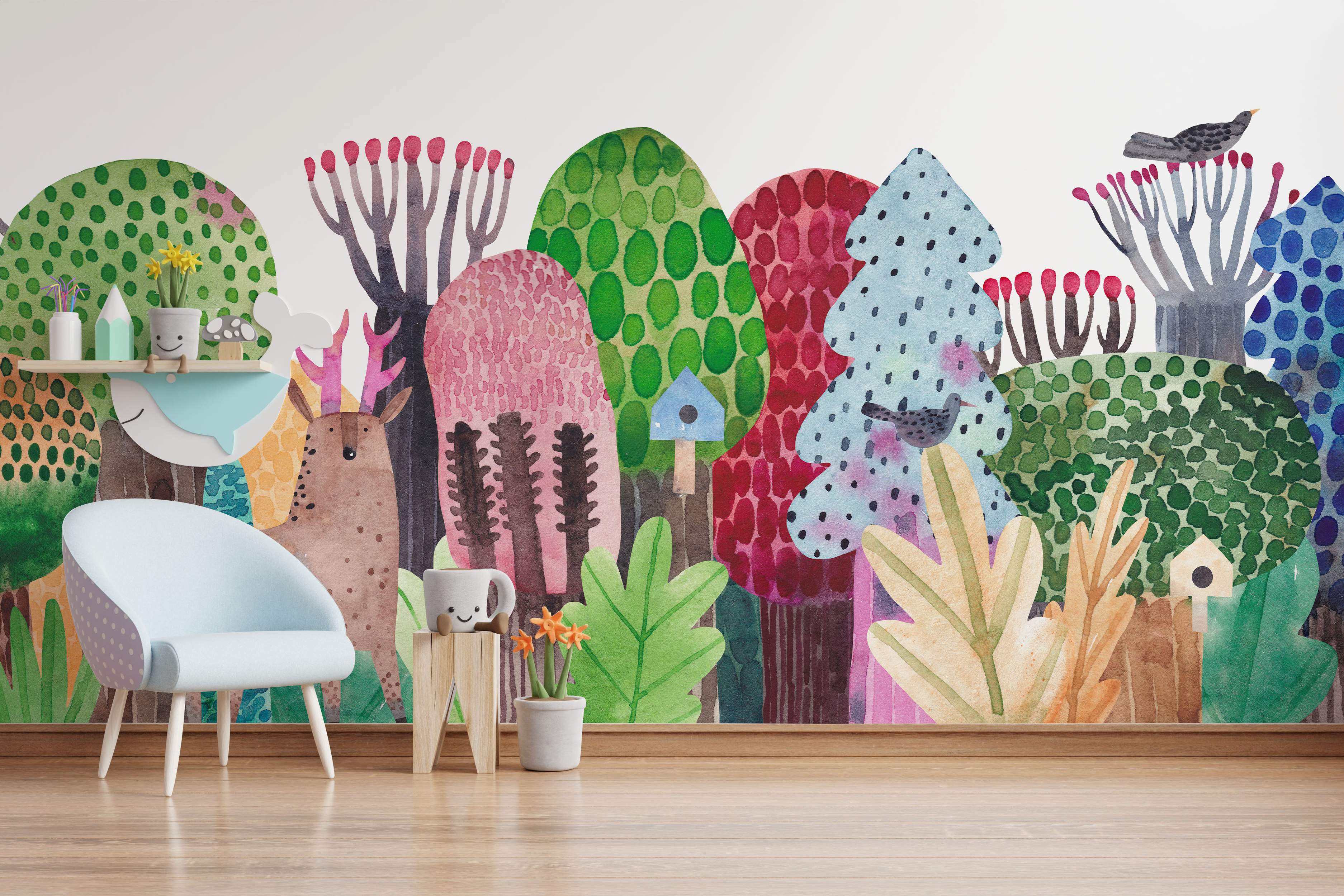 Whimsical watercolor mural depicting a colorful forest scene with stylized trees, plants, a deer, birds, and small birdhouses.
