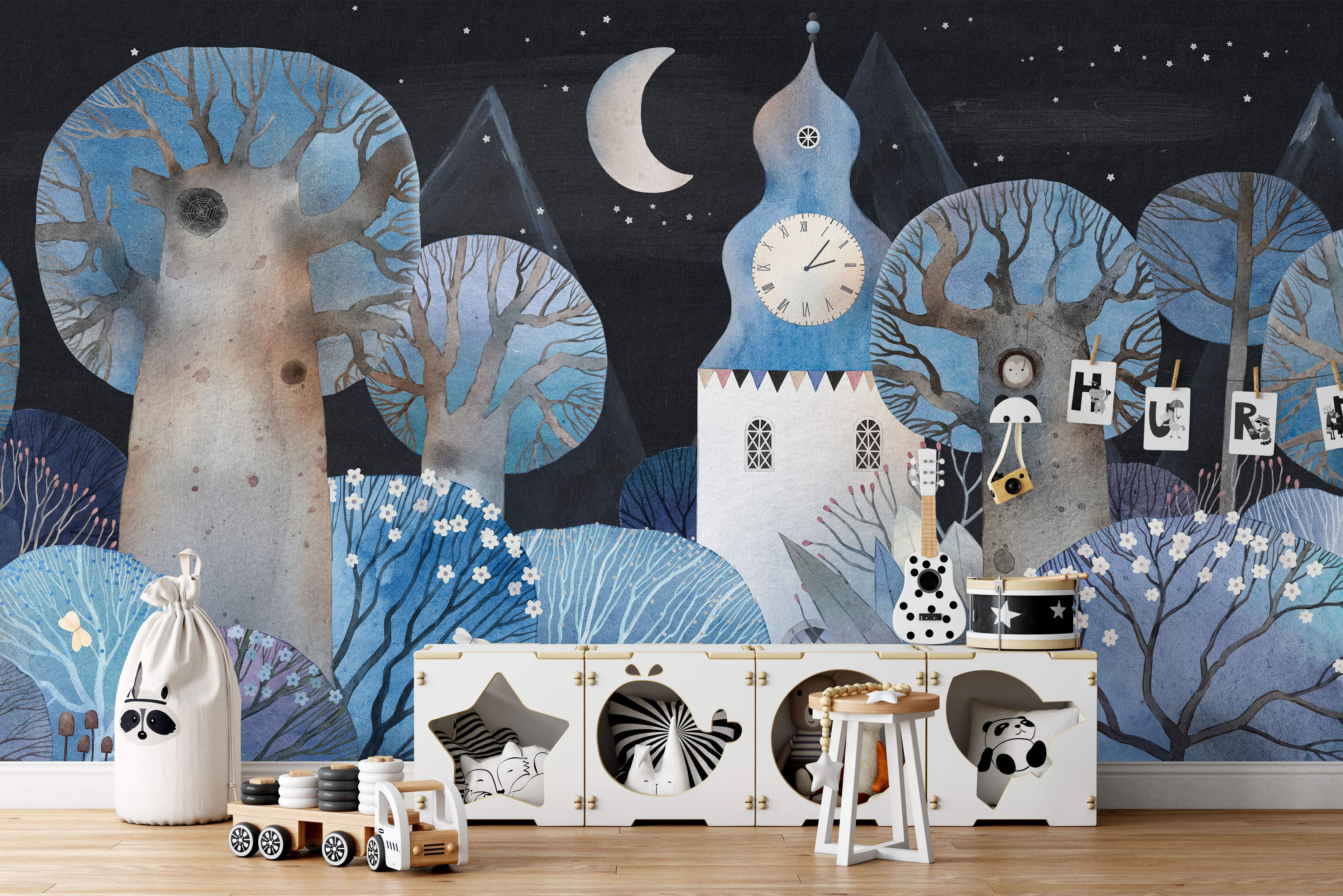 Whimsical mural of a night forest in blues and greys featuring stylized trees, a clock tower, crescent moon, and stars.