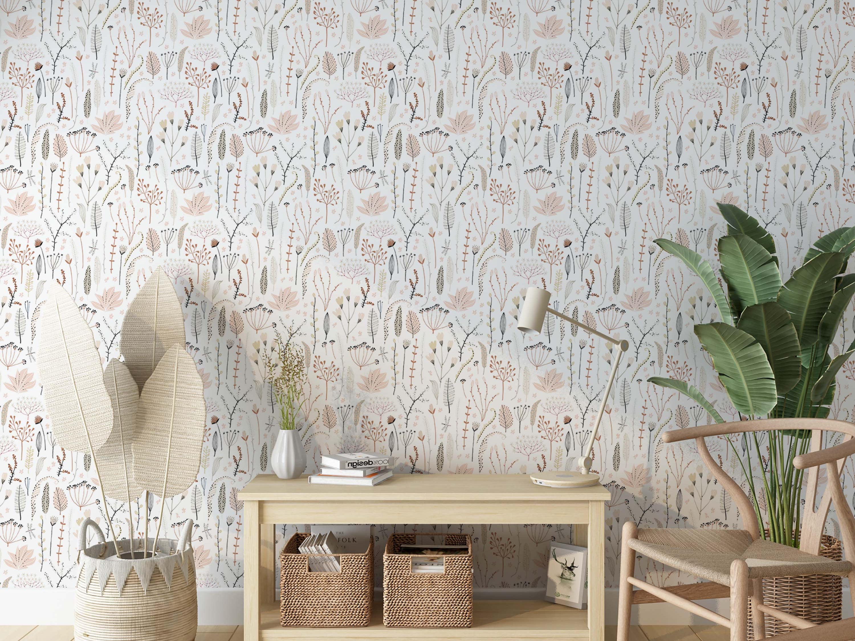 Delicate wallpaper featuring an array of stylized botanical elements in muted pink, brown, and gray against a white field.