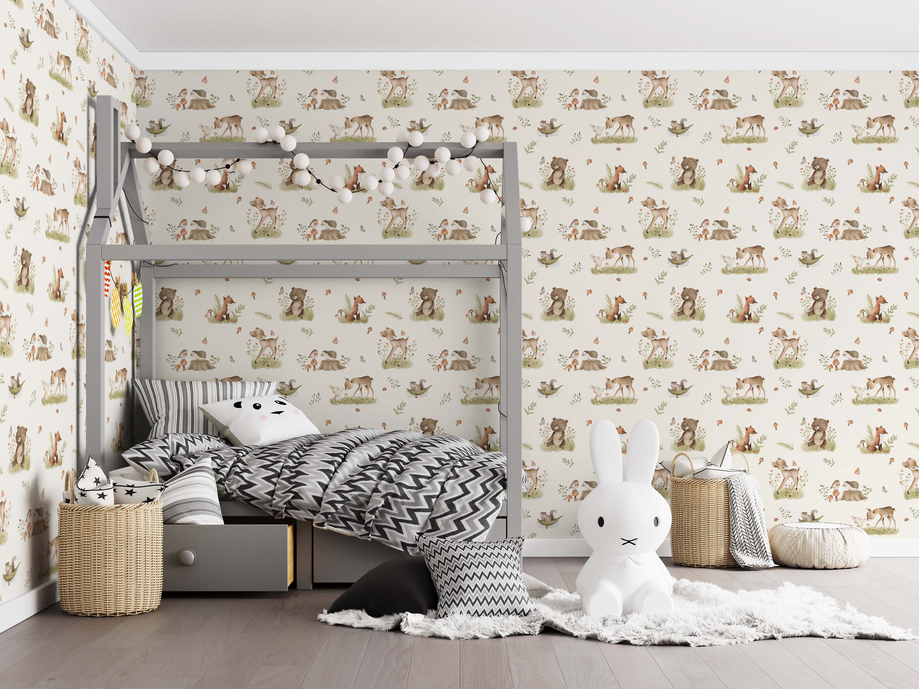 Repeating wallpaper with watercolor woodland animals like deer, bears, and foxes in soft browns and greens on a light cream background.