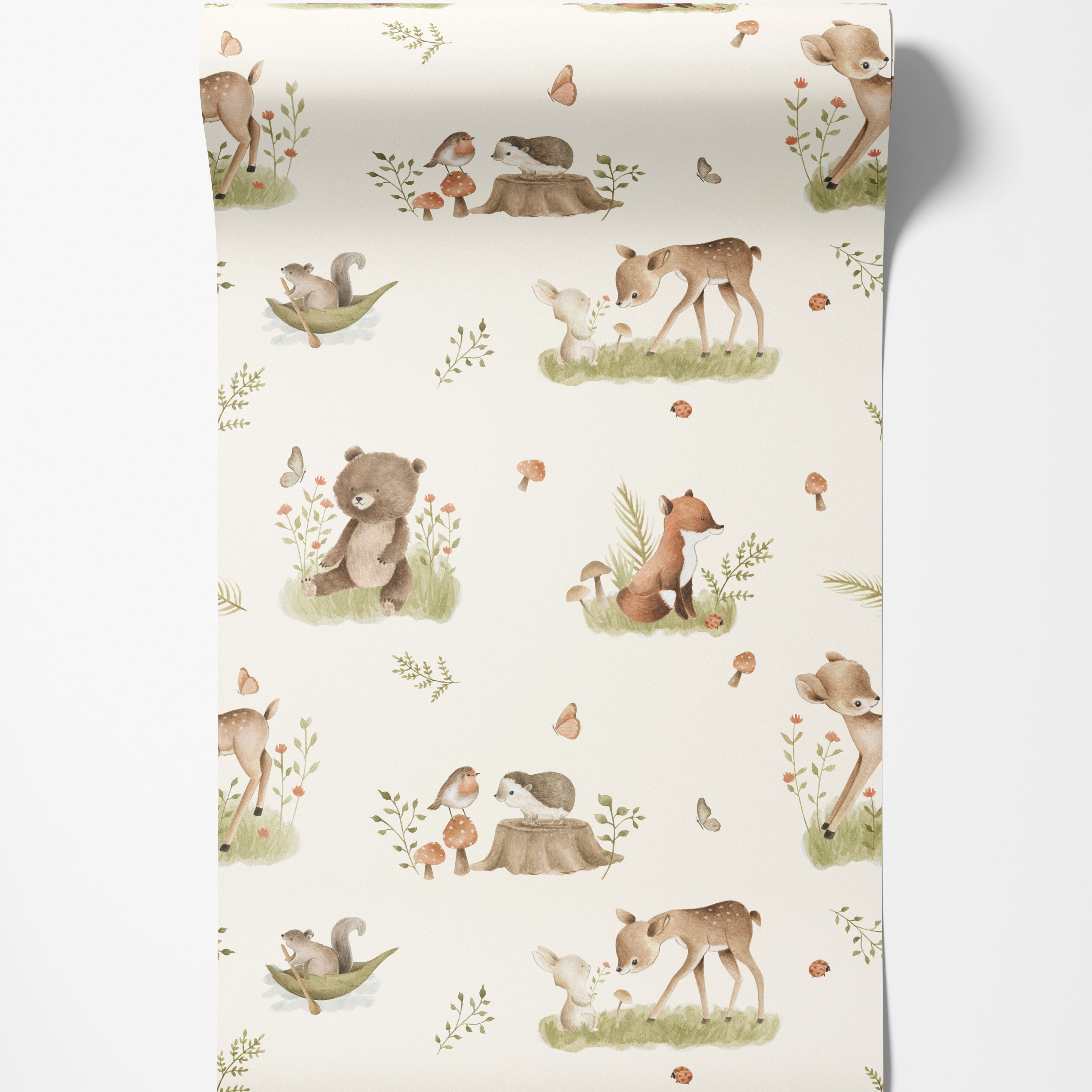 Wallpaper with a charming watercolor pattern of woodland animals including deer, bears, and foxes, set amongst foliage and mushrooms.