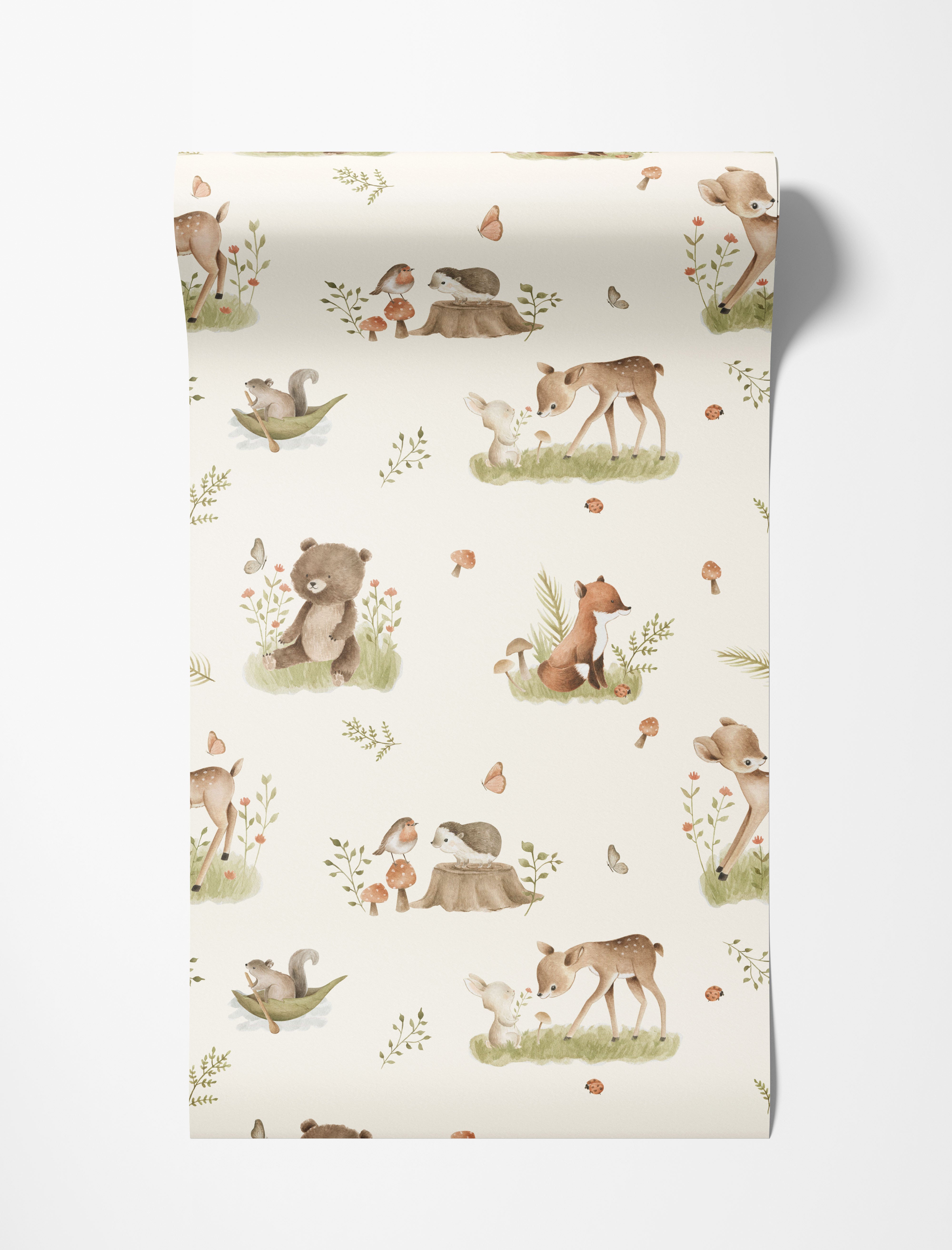 Wallpaper with a charming watercolor pattern of woodland animals including deer, bears, and foxes, set amongst foliage and mushrooms.