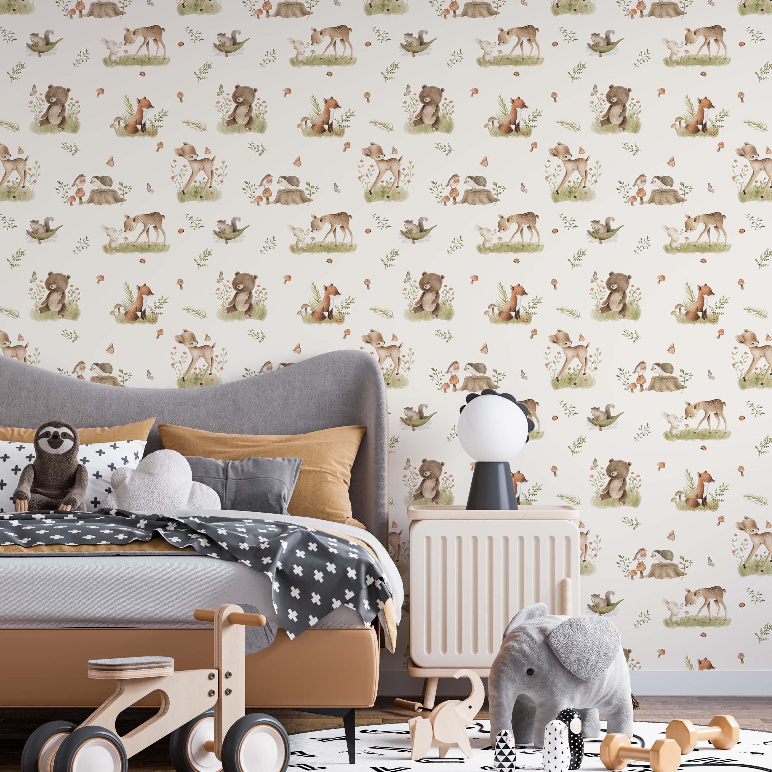 Repeating wallpaper with a watercolor woodland theme, featuring animals in soft browns and greens on an off-white background.