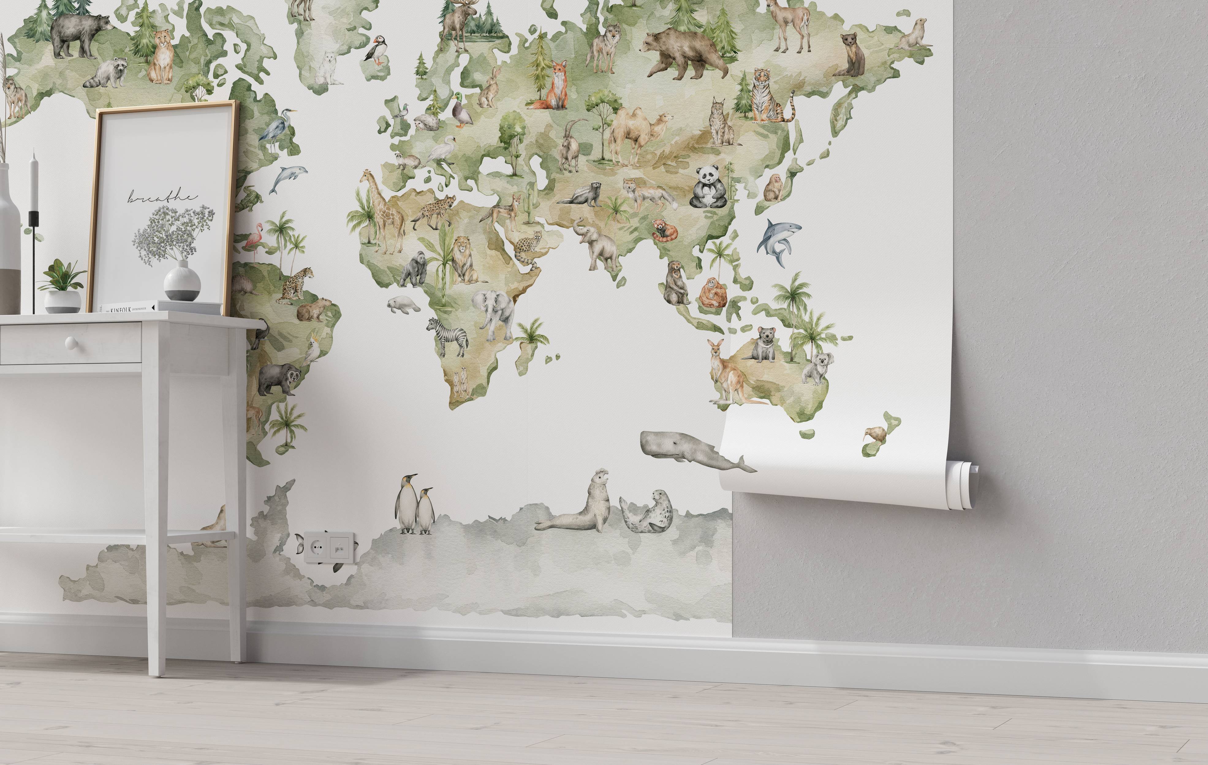 Watercolor world map mural in green and beige, featuring illustrations of animals on their respective continents.
