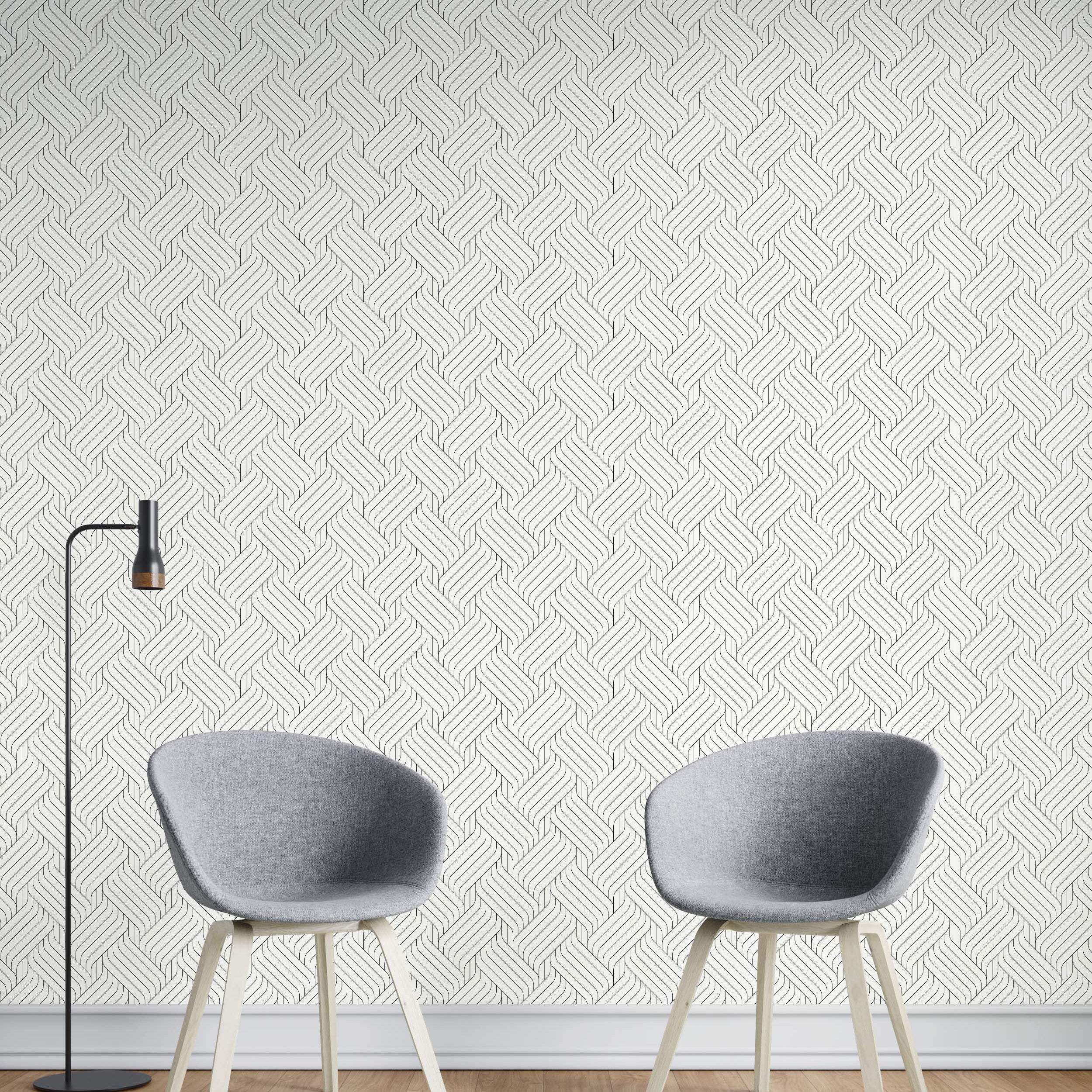 White wallpaper with a repeating geometric pattern of thin, interwoven black lines resembling a braid.
