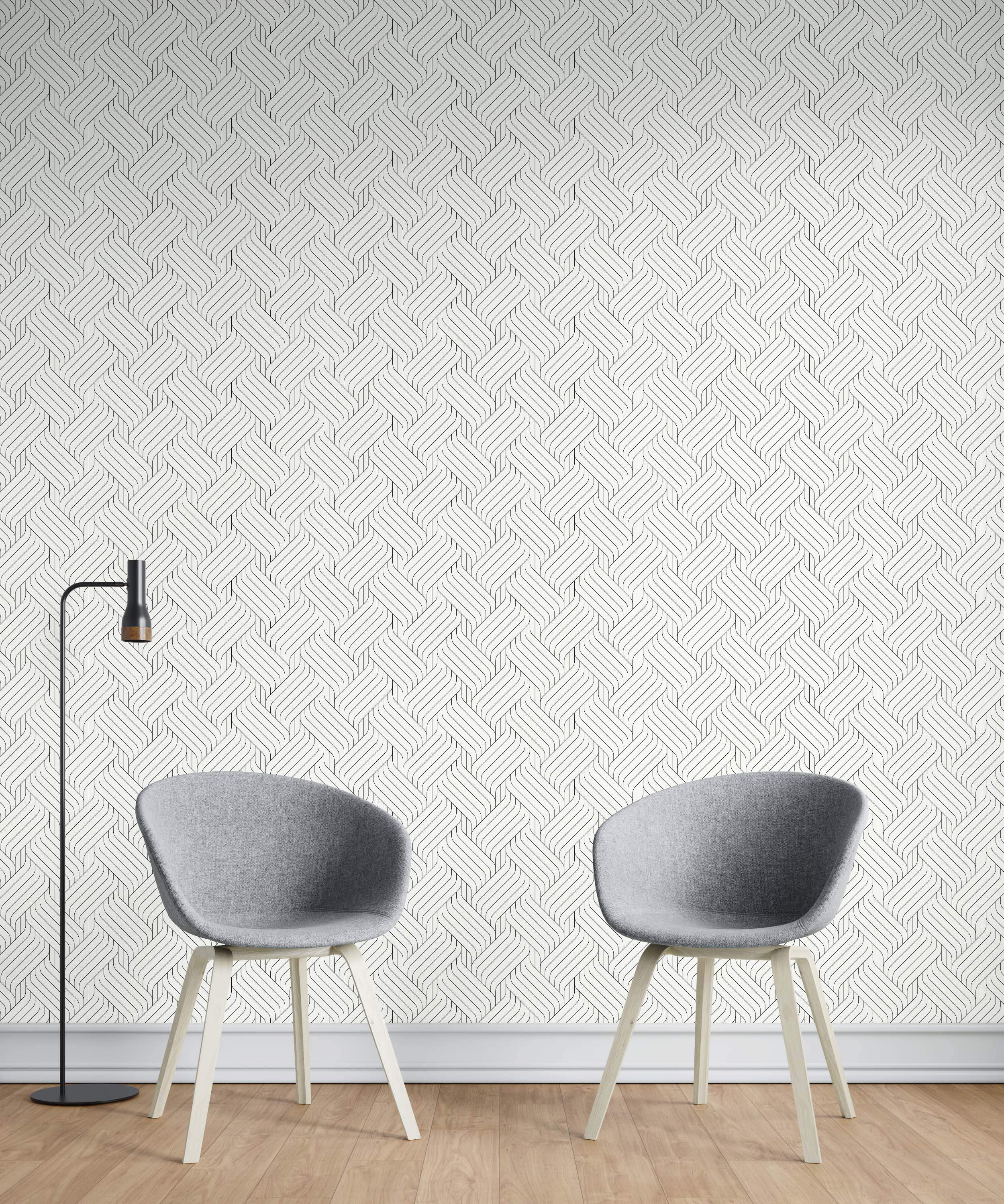 White wallpaper with a repeating geometric pattern of thin, interwoven black lines resembling a braid.