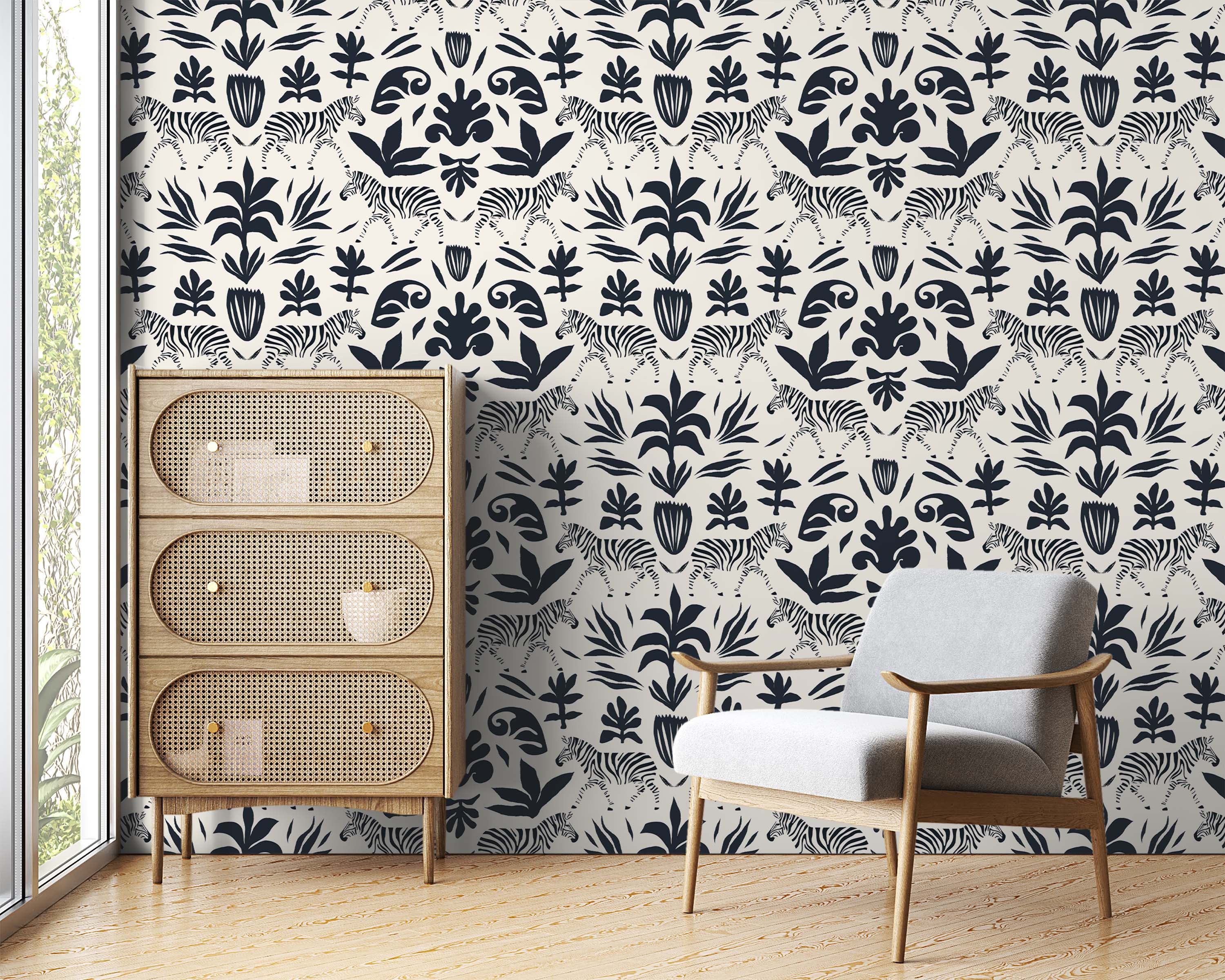 Cream wallpaper featuring a repeating pattern of black illustrated zebras and stylized botanical silhouettes.
