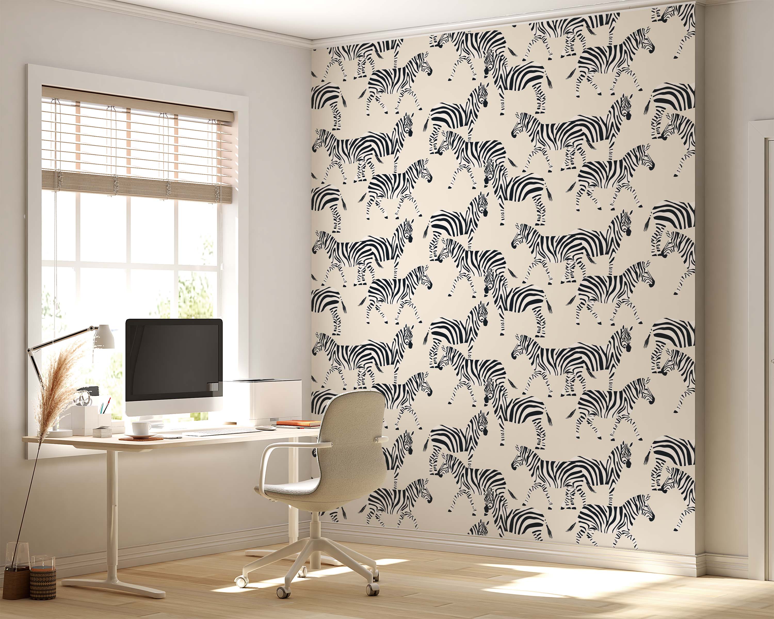 Wallpaper with a repeating pattern of black stylized zebras walking on a cream background.