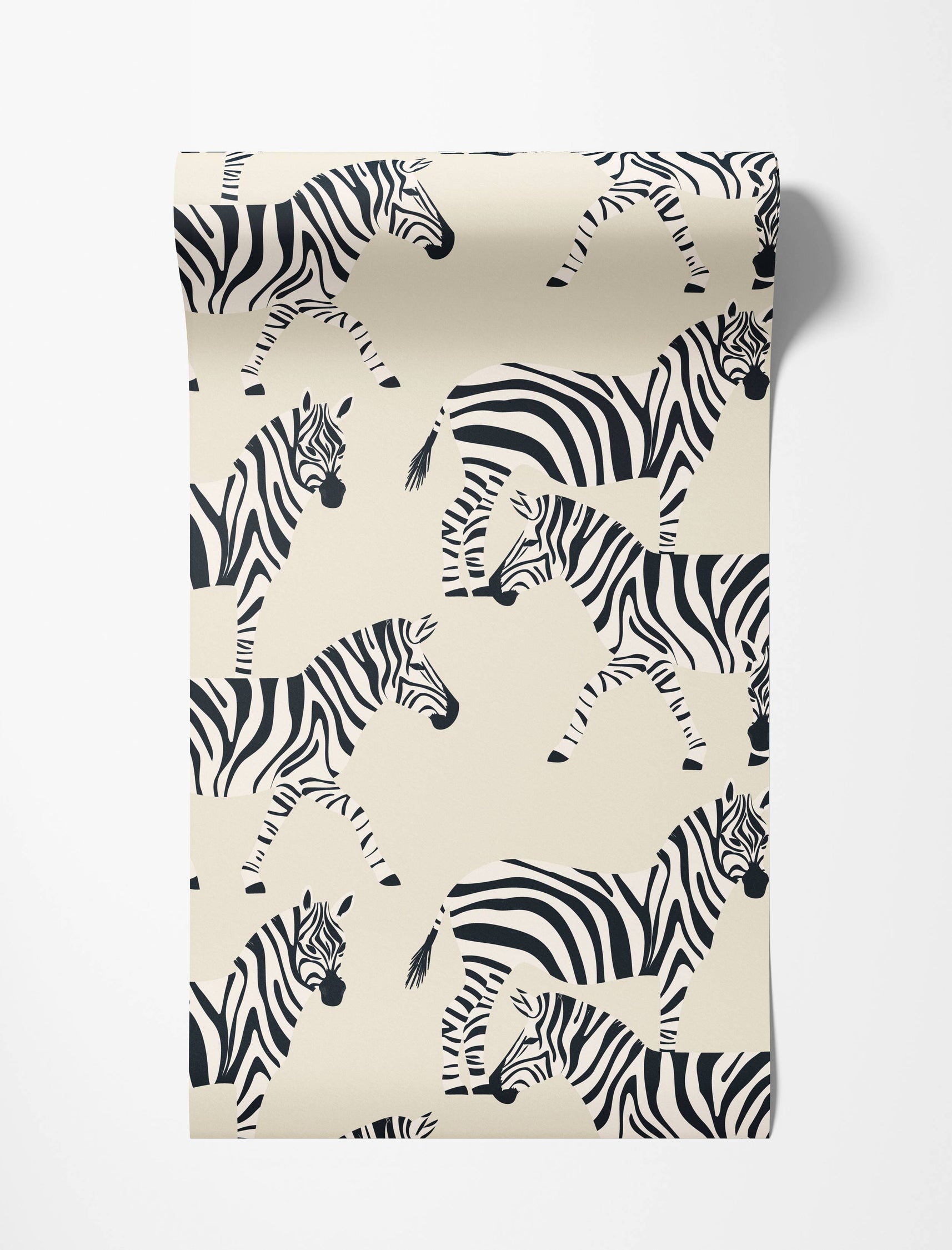 Wallpaper with a repeating black zebra print on a cream background.