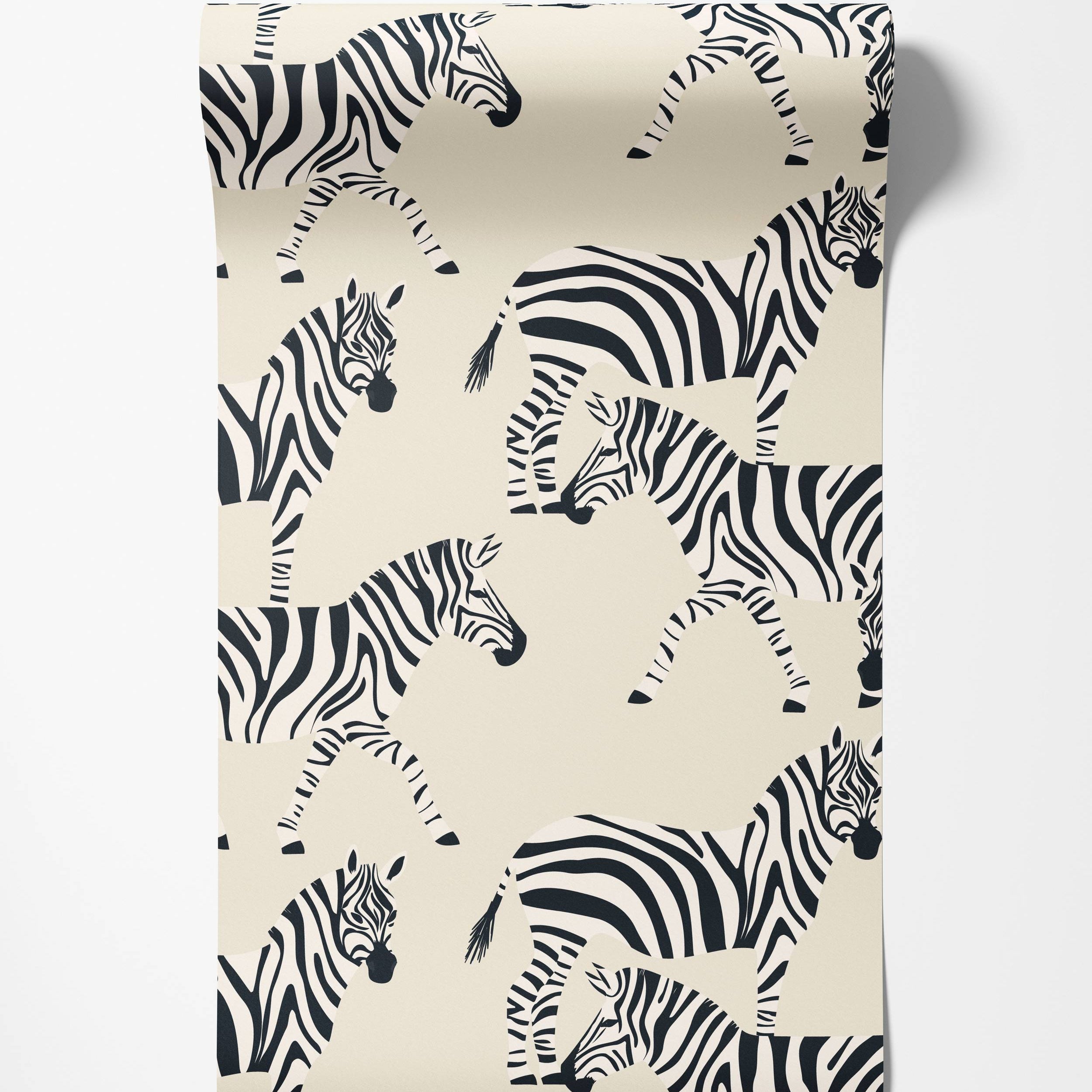 Wallpaper with a repeating black zebra print on a cream background.